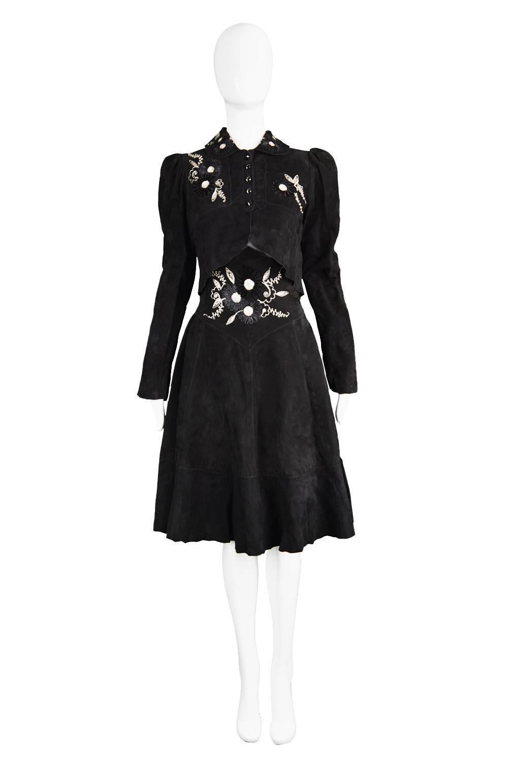 An incredible vintage two piece from the 1970s by cult British boutique label Tuttabankem - who created incredible artisinal and bohemian designs - with iconic designers like Ann Buck and Katharine Hamnett designing for them. In a supple black suede