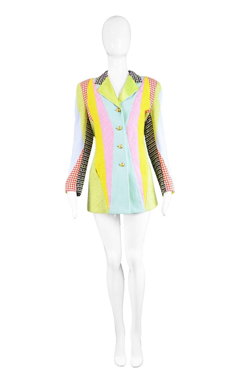A beautiful and striking vintage women's blazer from the 80s by luxury designer, Margaretha Ley for Escada. With bold panels of couture quality fabrics including tweed boucle, green and yellow satin, pink embroidery and matelassé and red and white