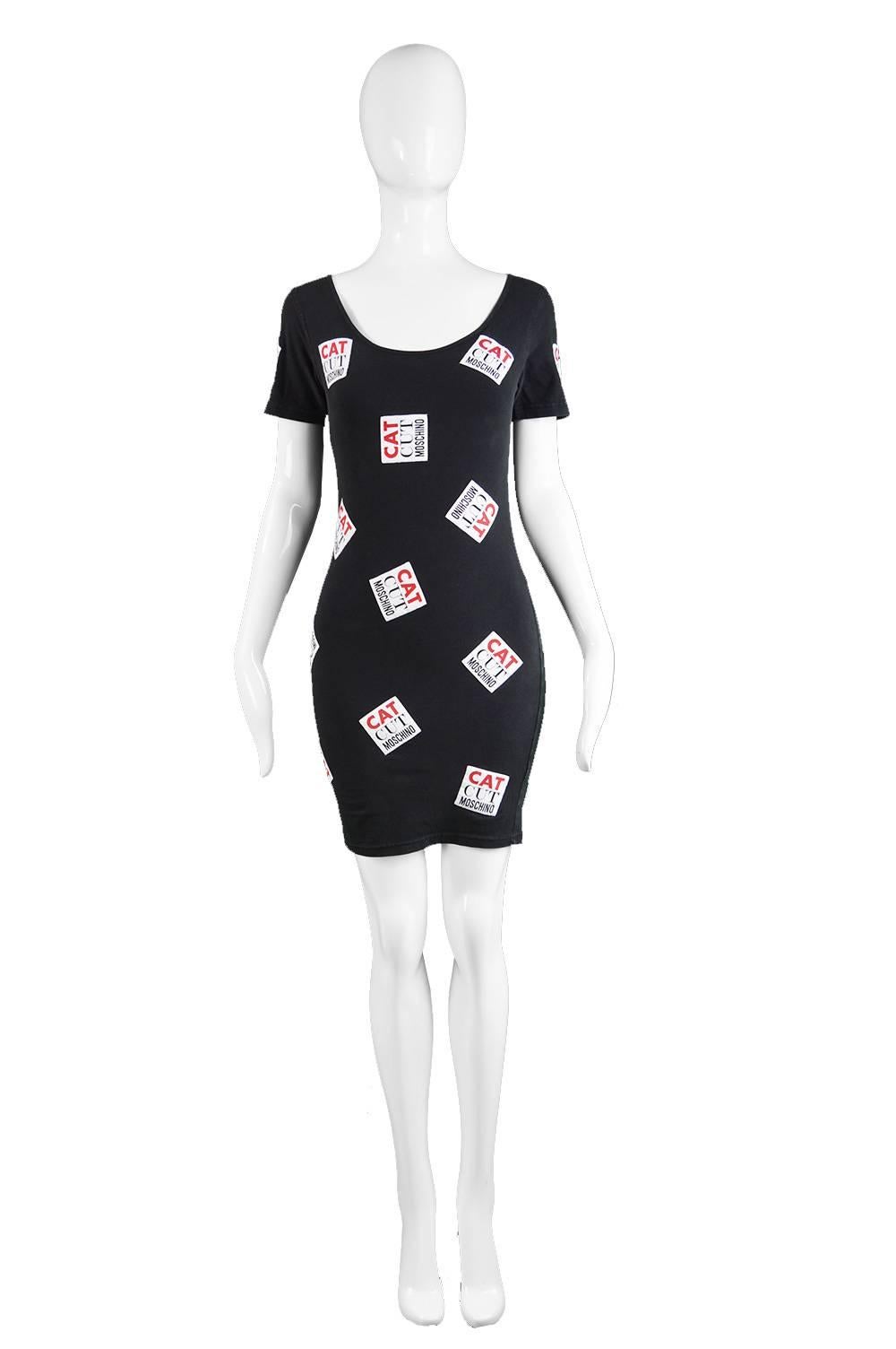 A stunning vintage Moschino mini party dress from the 90s, Made prior to 1995 before Moschino Jeans stopped being produced by Simint. With novelty, fun 'cat cut Moschino' patches / appliques throughout a black bodycon cotton-spandex jersey fabric