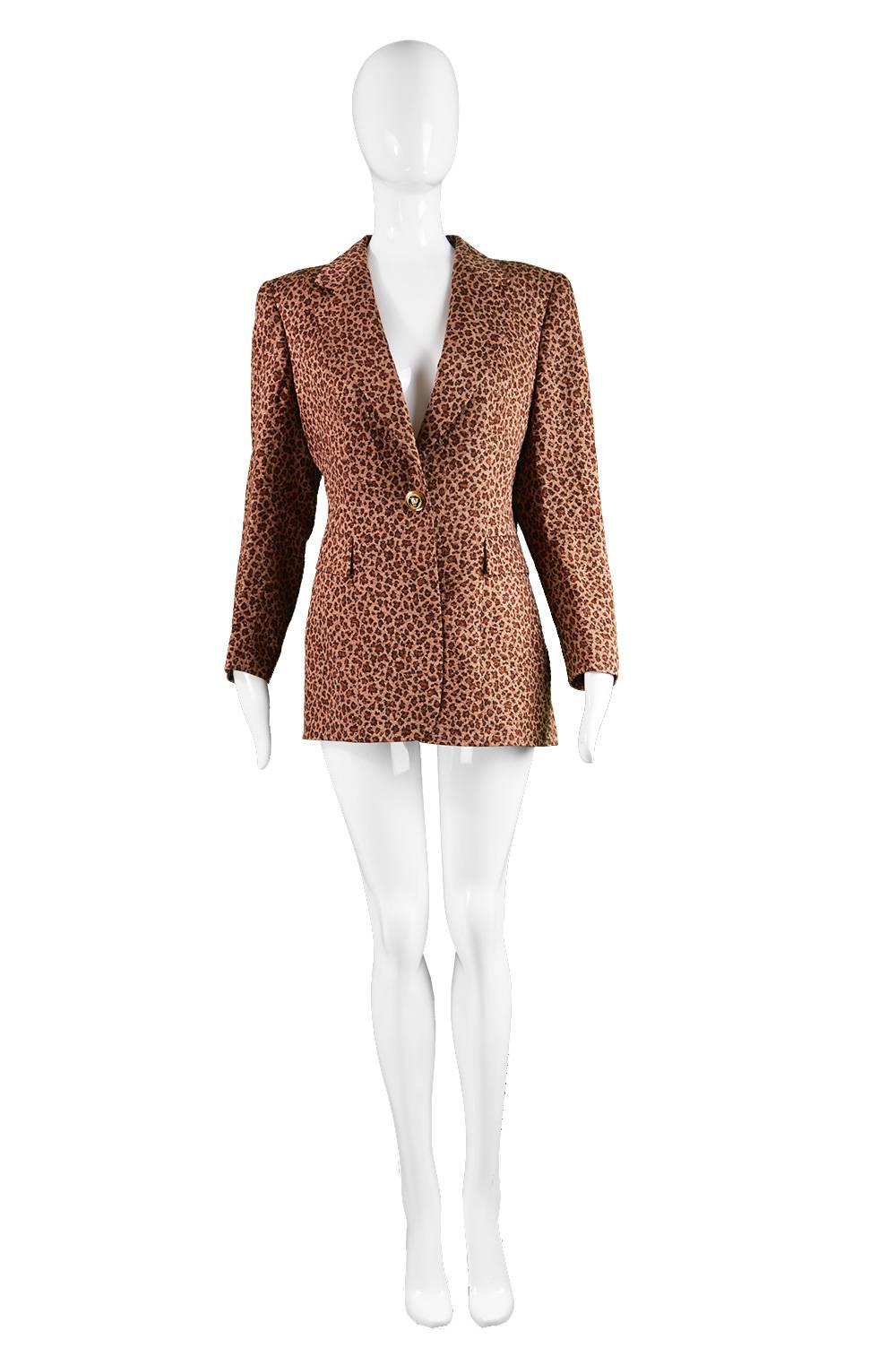 A beautiful vintage women's blazer from the 1980s by luxury designer, Margaretha Ley for Escada. In a silk & wool leopard print fabric with sparkly gold lurex running throughout - such a quintessential animal print and this take is so timeless and