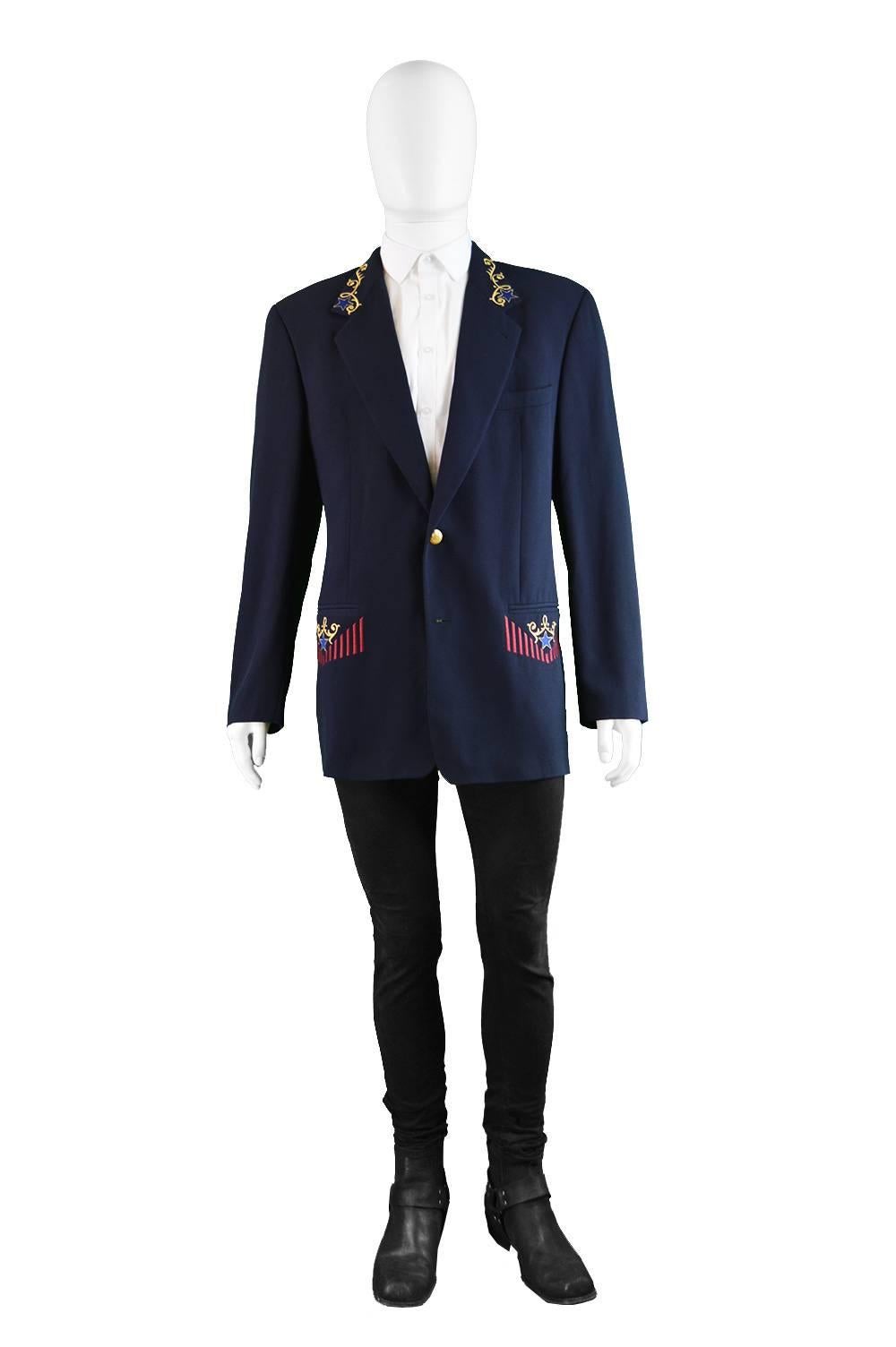 A stunning vintage mens blazer from the 80s by luxury Italian fashion house, Byblos - who Gianni Versace was once the designer for. In a dark navy blue pure wool with gold lamé and satin embroidery to the notched lapels and pockets. With single