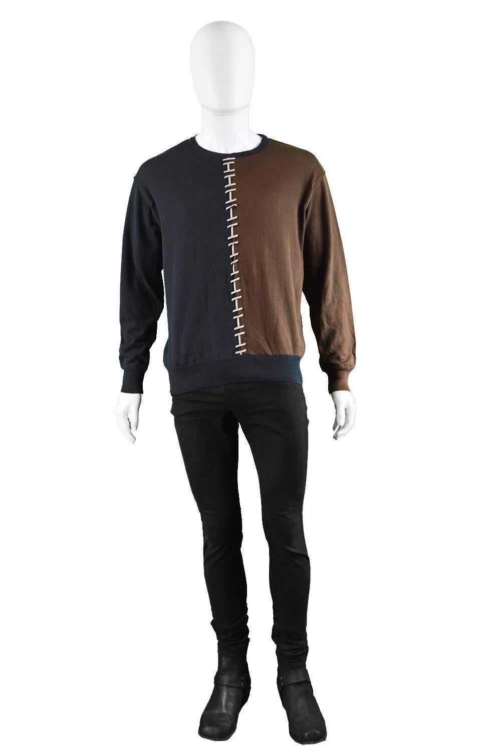 An awesome vintage men's sweatshirt / jumper from the 80s by legendary french designer, Claude Montana. In a black cotton fabric down one side and brown cotton on the other side to create a color blocking effect with a lace design in between, adding