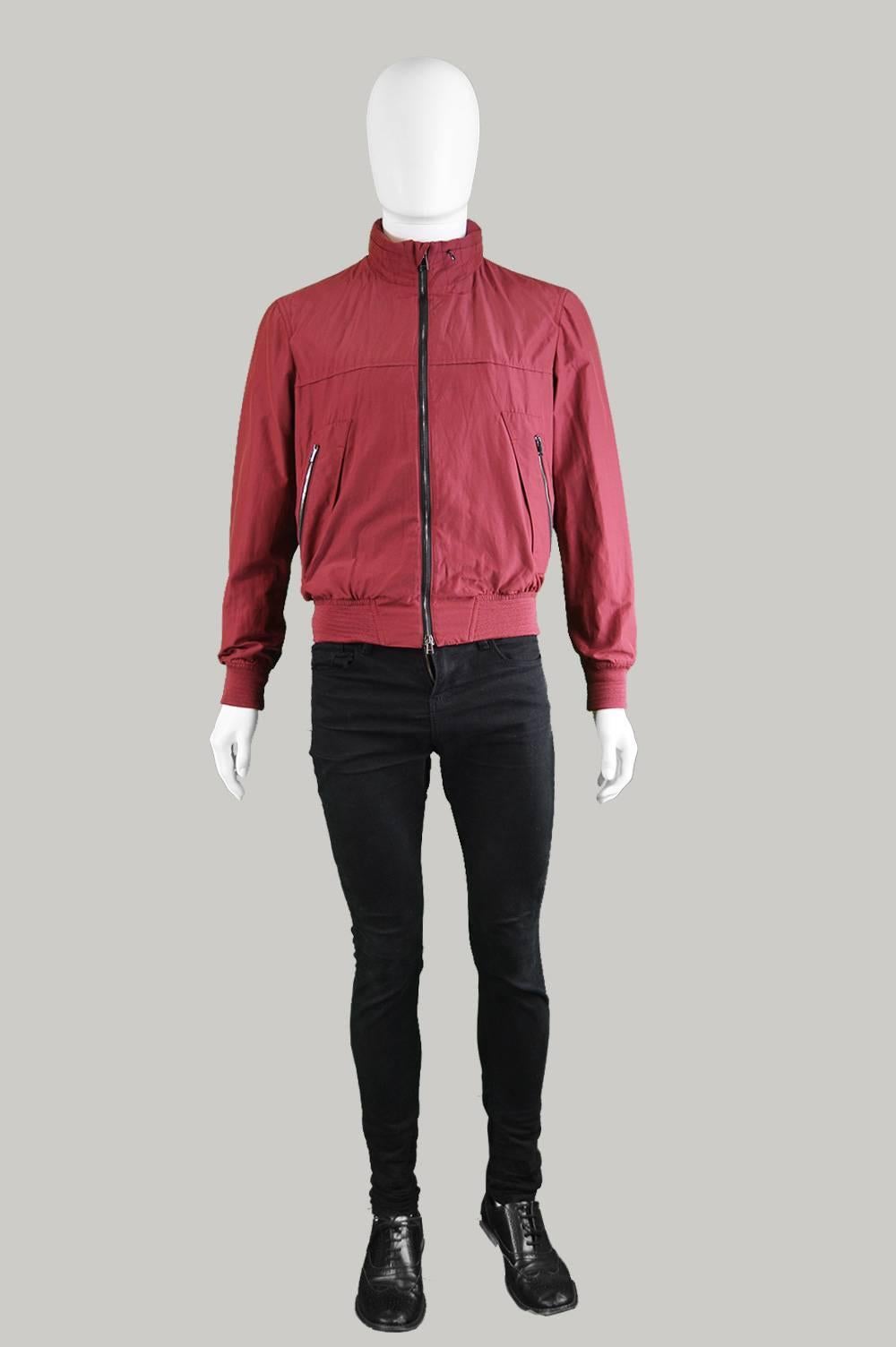 An awesome vintage men's harrington/ bomber jacket by Valentino in a wine/ burgundy colour with elasticated cuffs and bottom. Very high quality, as to be expected from such a respected Italian fashion house. The quality, double zip pulls at the