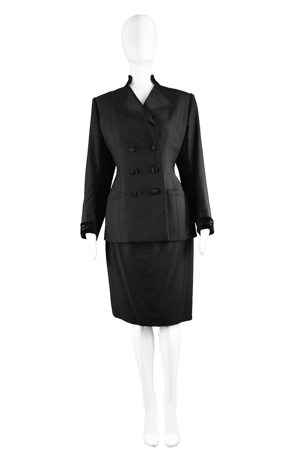 An incredibly elegant vintage Hardy Amies two piece skirt suit from c. the 60s - with the couture label, this set was incredibly well made by hand in Hardy Amies Savile Row atelier. With a nipped waist and bustle-like detail to the back. The buttons