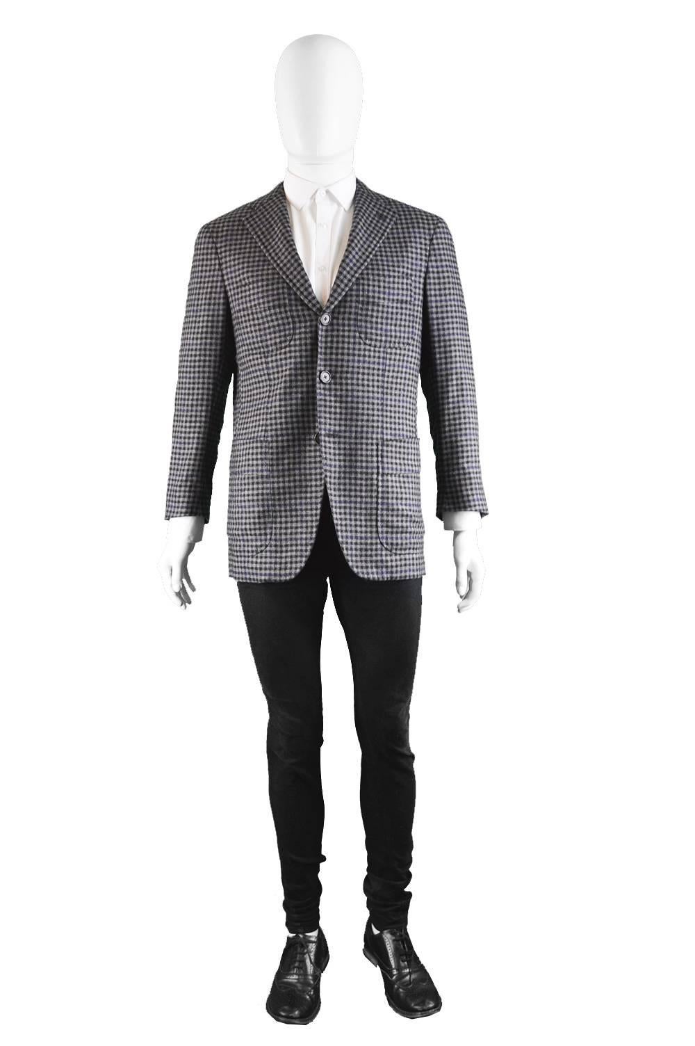 A luxurious mens sport coat / blazer from c. the 1990s by Gianfranco Ferre for his high-end 'homme couture' line. In a grey alpaca, angora, cashmere and wool fabric with a check pattern throughout. With four patch pockets to the front and a large