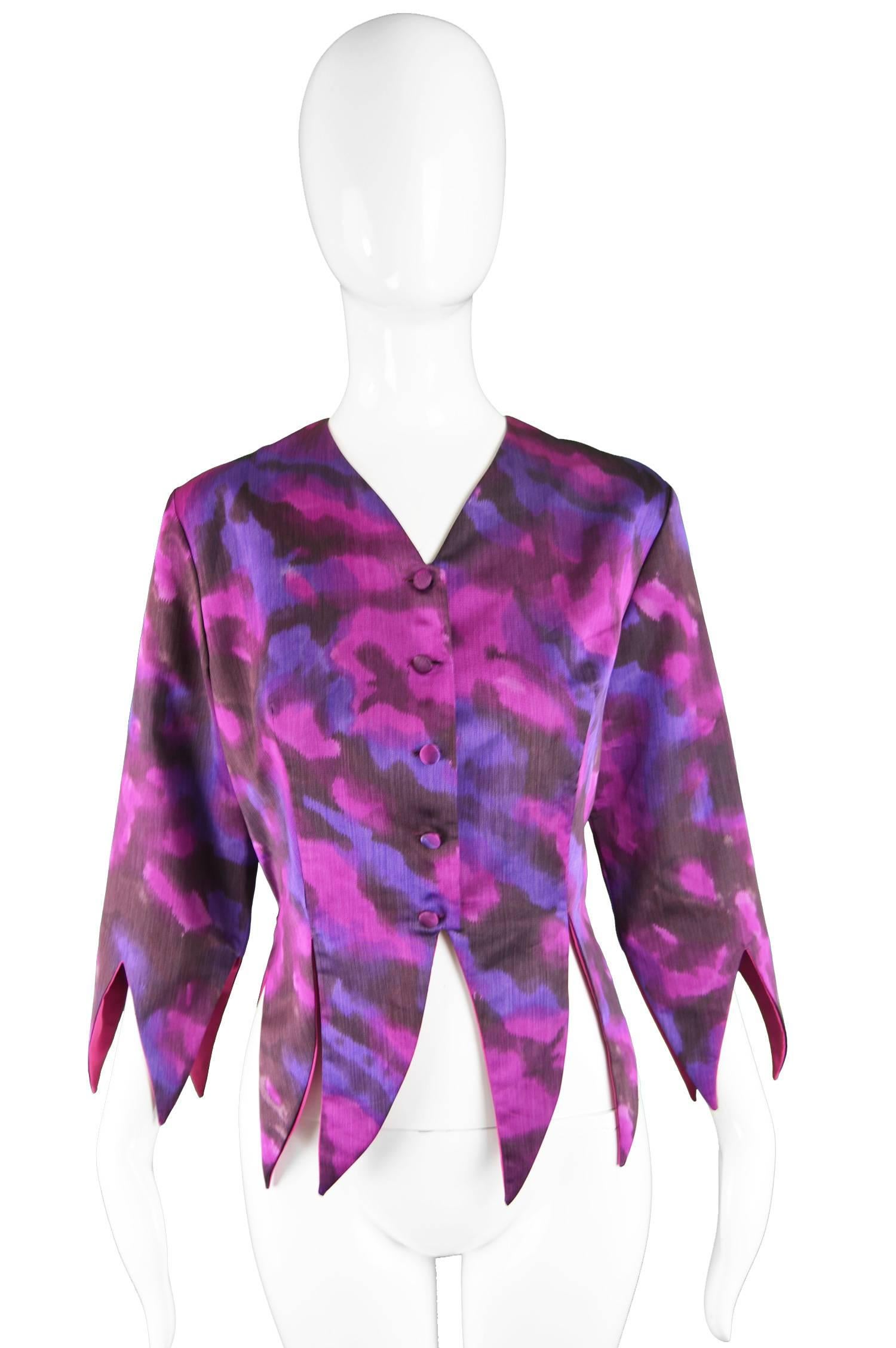 A crazy yet high quality vintage women's jacket from c. the 1980s in a purple and pink marbled effect fabric with unusual pointed hem creating a punk luxe effect and three quarter sleeves. By Michael Welford for Romney

Estimated Size: UK 12/ US 8/