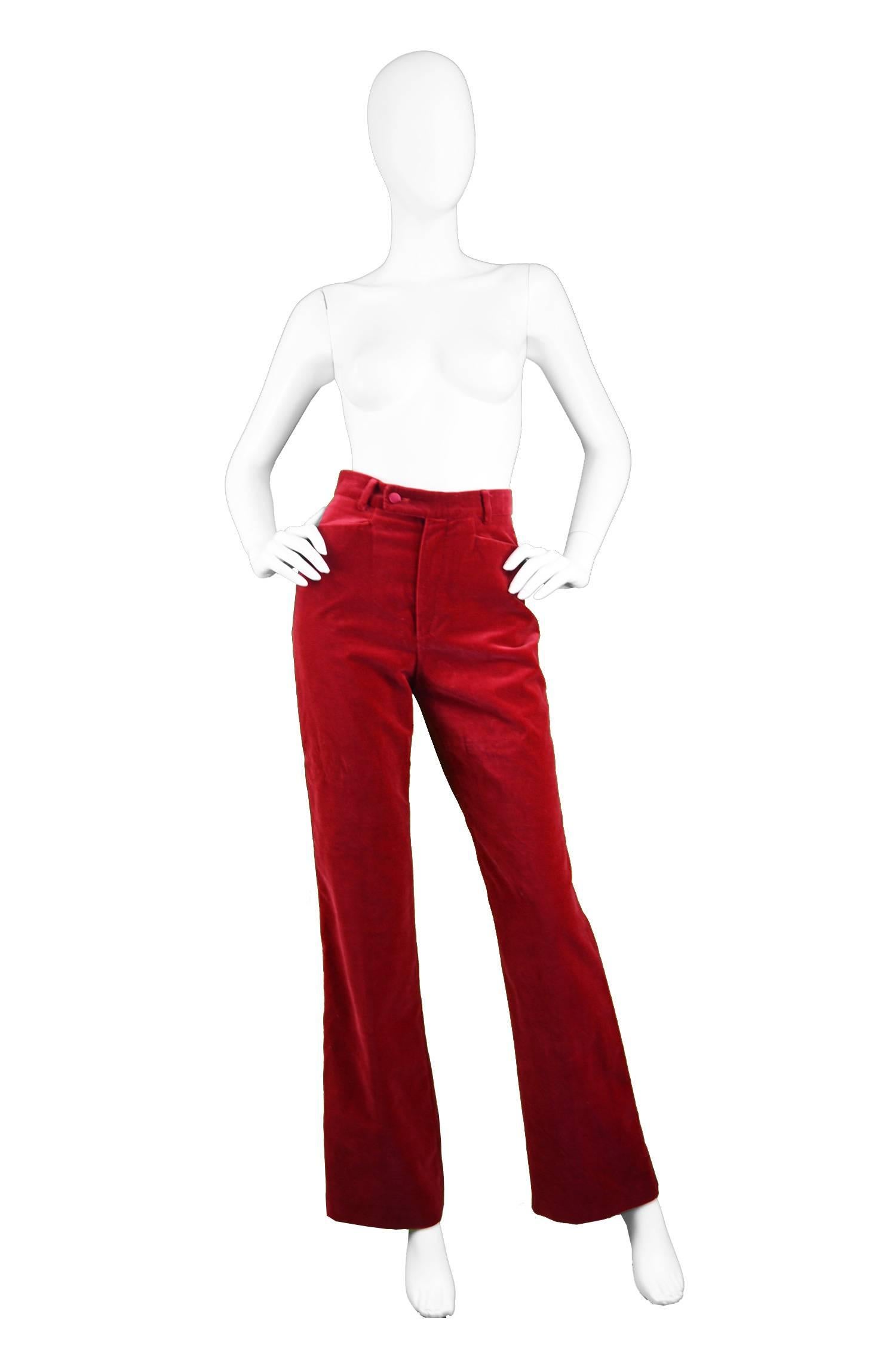 A pair of incredible vintage trousers from the 90s by Gucci during Tom Ford's period there. So sexy with a high waist in a luxurious red velvet with satin stripe down each leg and a subtle flare - giving a 1990s take on 1970s disco style. Perfect