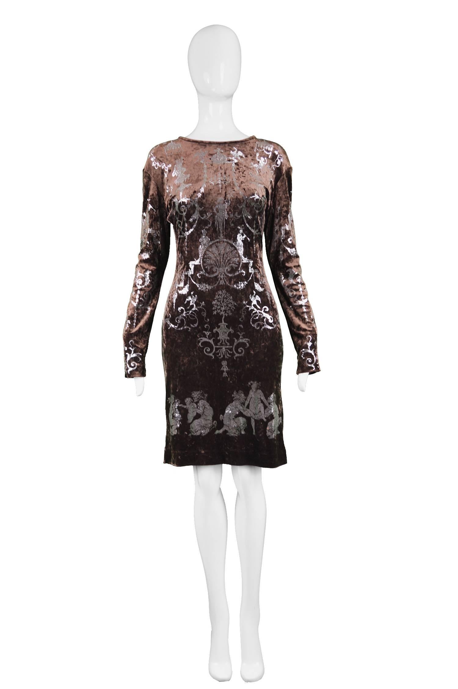 An incredible and extremely rare vintage Vivienne Westwood sheath dress from one of her most iconic and sought after collections - the portrait collection of Autumn-Winter 1990-1991. In a sumptuous brown stretch velvet with a silver metallic leaf