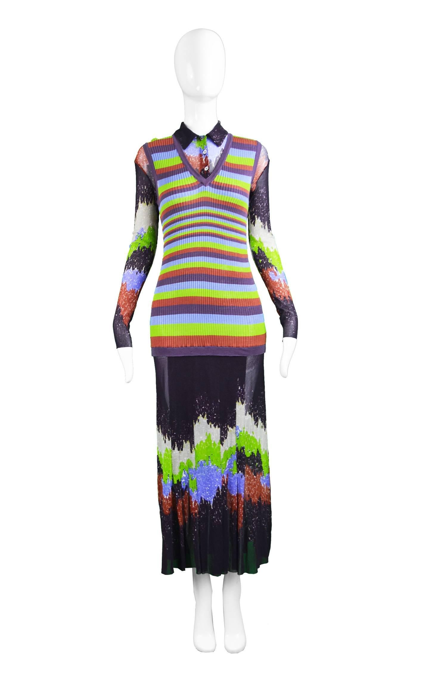 A stunning vintage maxi dress by iconic French designer, Jean Paul Gaultier for his Maille line c. 1990s. Dual layered with an attached sweater vest / mini dress style bodice which gives a 70s style look and a long maxi skirt which is pleated at the
