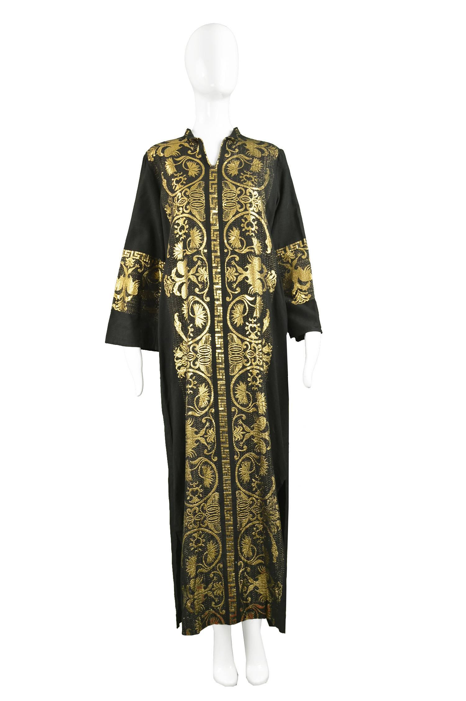 Vintage 1970s Black & Gold Lamé Embroidered Caftan Maxi Dress

Estimated Size: Women's Small to Medium due to loose fit. Please check measurements. 
Bust - 40” / 101cm
Waist - up to 40” / 101cm due to loose waist. 
Hips - 44” / 112cm
Length