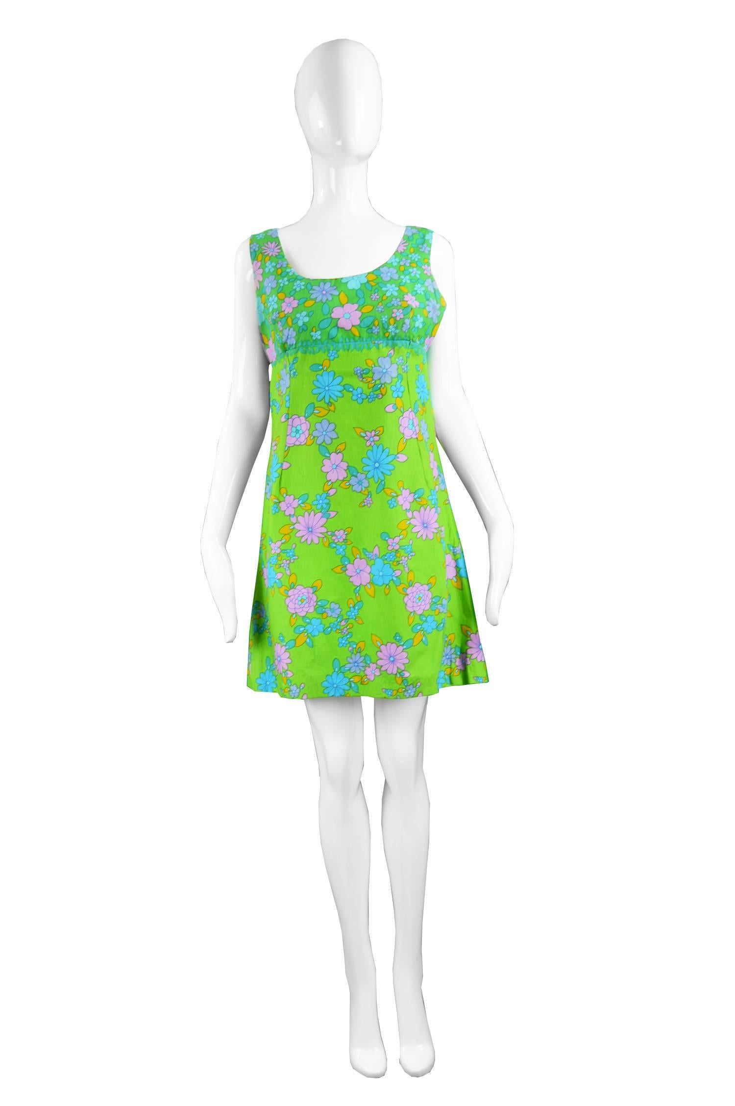 Jeff Banks for Clobber Vintage British Boutique Mini Dress, 1960s

Estimated Size: UK 12/ US 8/ EU 40. Please check measurements. 
Bust - 36” / 91cm
Waist - 32” / 81cm
Hips - 38” / 96cm
Length (Shoulder to Hem) - 33” / 84cm

Condition: Very Good