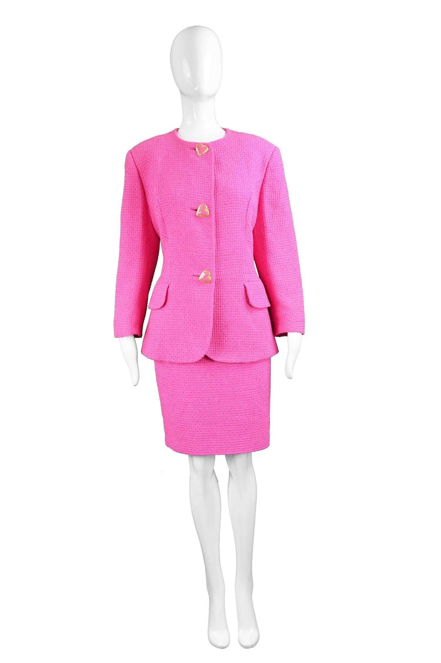 Tomasz Starzewski Pink Cotton Bouclé Skirt Suit with Love Heart Buttons, 1980s

Estimated Size: UK 12-14/ US 8-10/ EU 40-42. Please check measurements. 
Jacket
Bust - 40” / 101cm
Length (Shoulder to Hem) - 26” / 66cm
Shoulder to Shoulder - 17” /