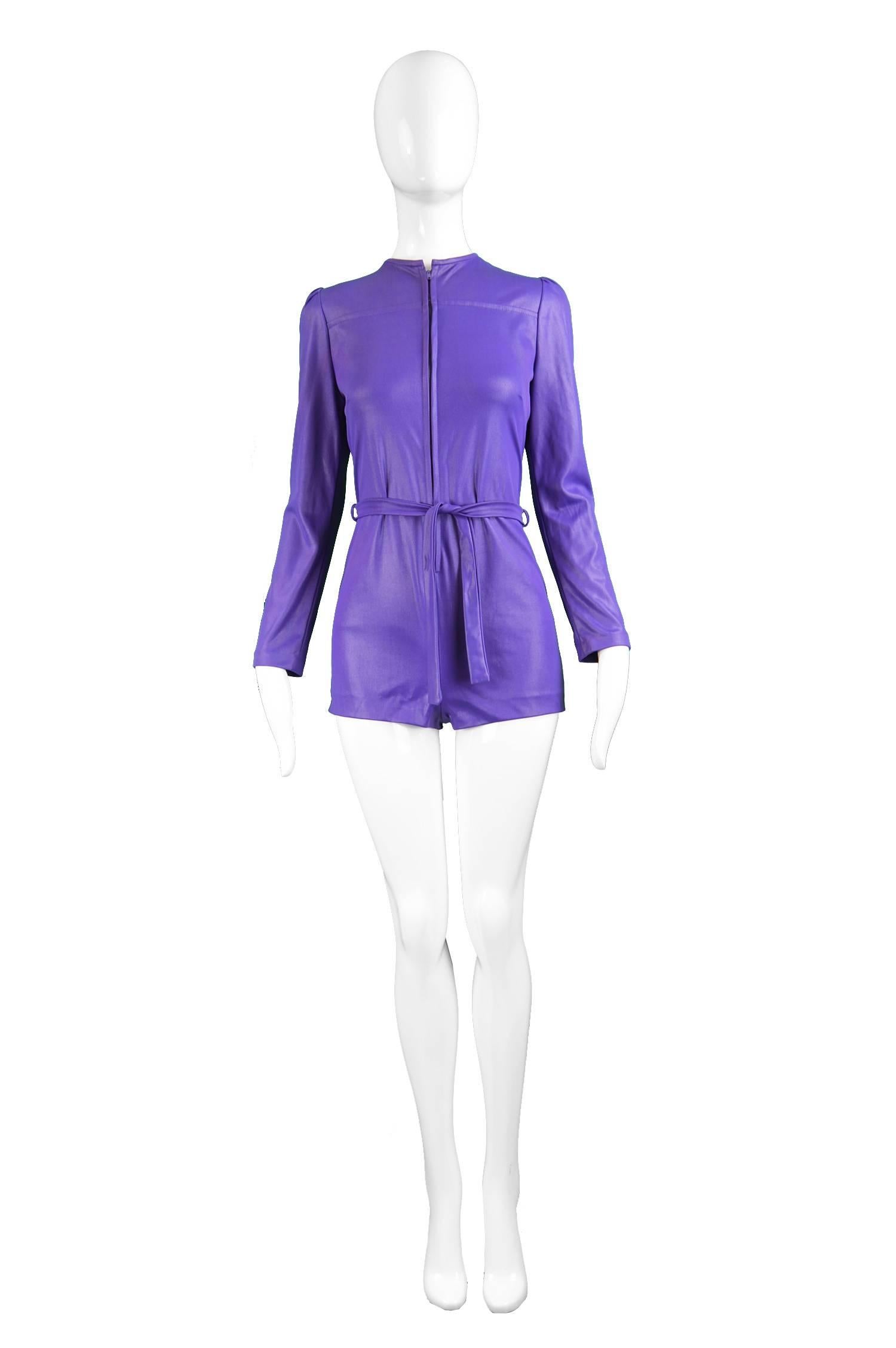 London Mob of Carnaby Street Purple Wet Look Playsuit, 1960s

Size: fits roughly like a modern women's UK 8/ US 4/ EU 36 (Check measurements to ensure best fit)
Bust - 32” / 81cm
Waist - 28” / 71cm (can be pulled in with belt)
Hips - 34” / 86cm
