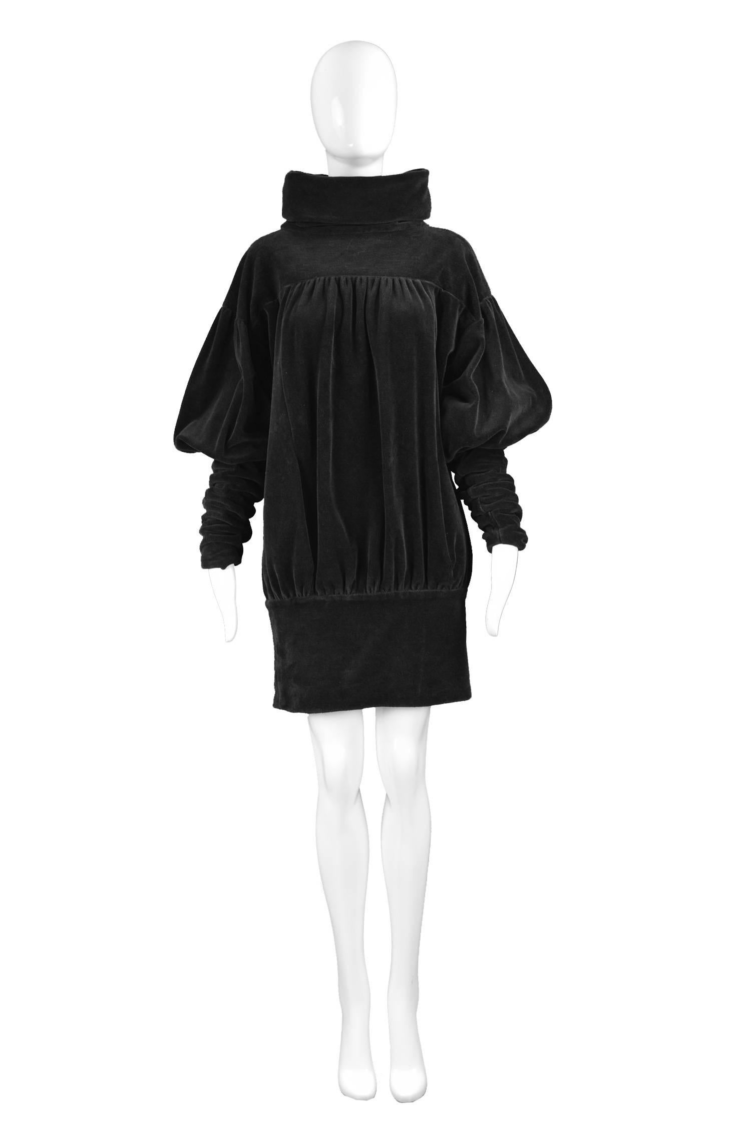 Gina Fratini Avant Garde Black Puff Sleeve Velour Dress, 1970s

Estimated Size: UK 8/ US 4/ EU 36. The Hips are the only fitted measurement
Bust -  Up to 48” / 122cm
Waist - Free
Hips - 34” / 86cm
Length (Shoulder to Hem) - 32” / 81cm
Shoulder to