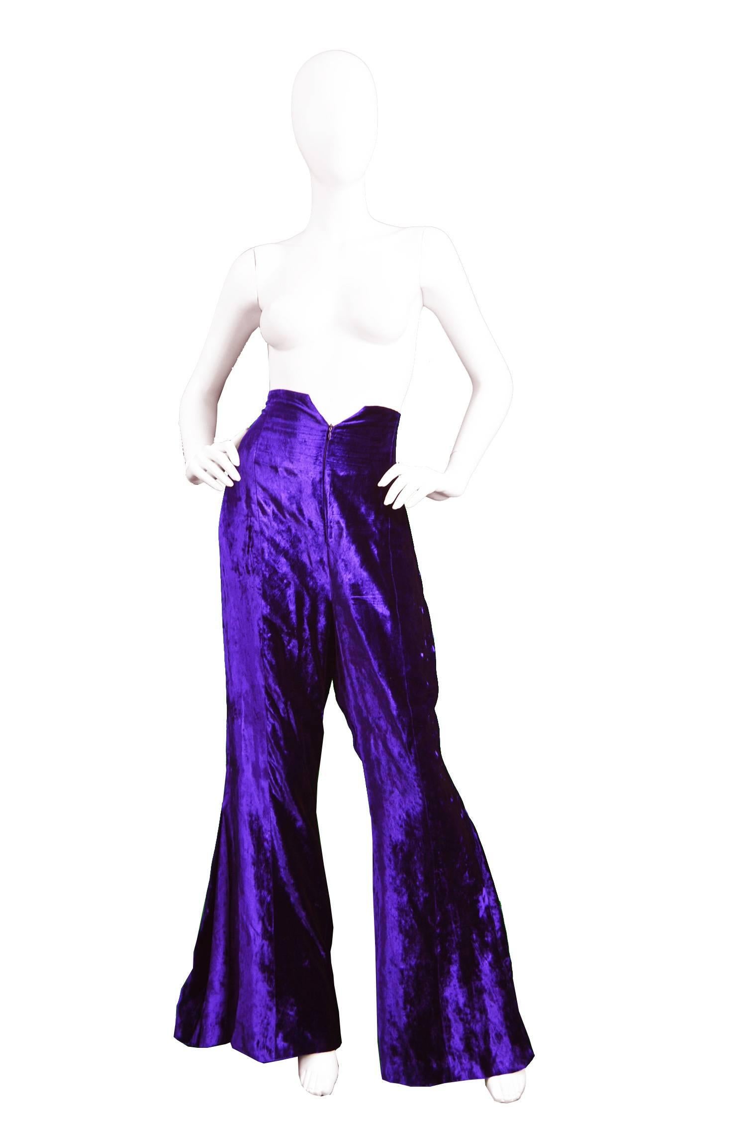 Norma Kamali OMO Purple Velvet Ultra High Waist Bell Bottom Flares, 1980s

Estimated Size: UK 12-14/ US 8-10/ EU 40-42. Please check measurements.
High Waist - 30” / 76cm
Hips - up to 40” / 101cm
Rise - 17” / 43cm
Inside Leg - 34” / 86cm

Condition: