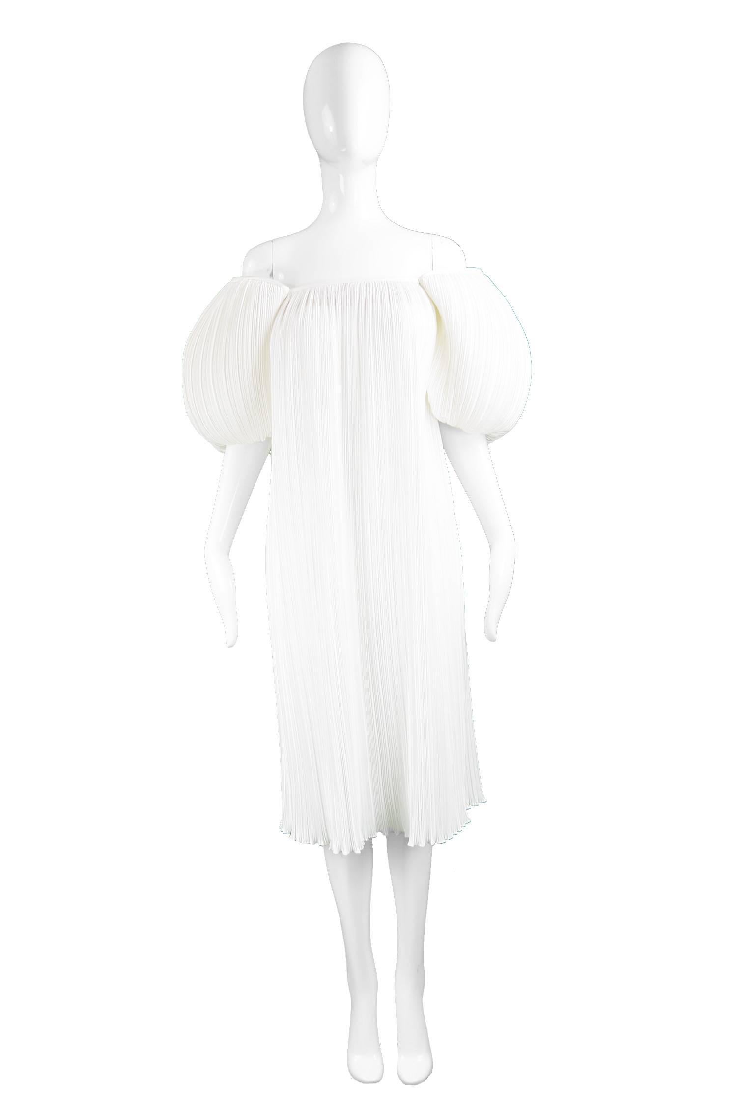 S.G. Gilbert for I. Magnin Vintage Ethereal White Fortuny Pleat Dress, 1980s

Estimated Size: UK 8/ US 4/ EU 36. Please check measurements.
Bust - 32” / 81cm
Waist - Free
Hips - Free
Length (Bust to Hem) - 37” / 94cm
 
Condition: Excellent Vintage