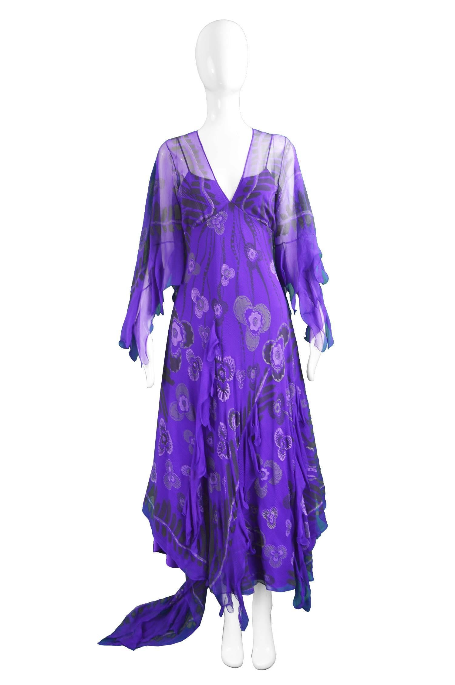 Zandra Rhodes Purple Floral Silk Chiffon Dress with Floor Length Train, c. 1970s-80s

Estimated Size: UK 10-12/ US 6-8/ EU 38-40. Please check measurements.
Bust - 35” / 89cm
Waist - 32” / 81cm
Hips - Up to 48” / 121cm
Length (Bust to Hem) - 42” /