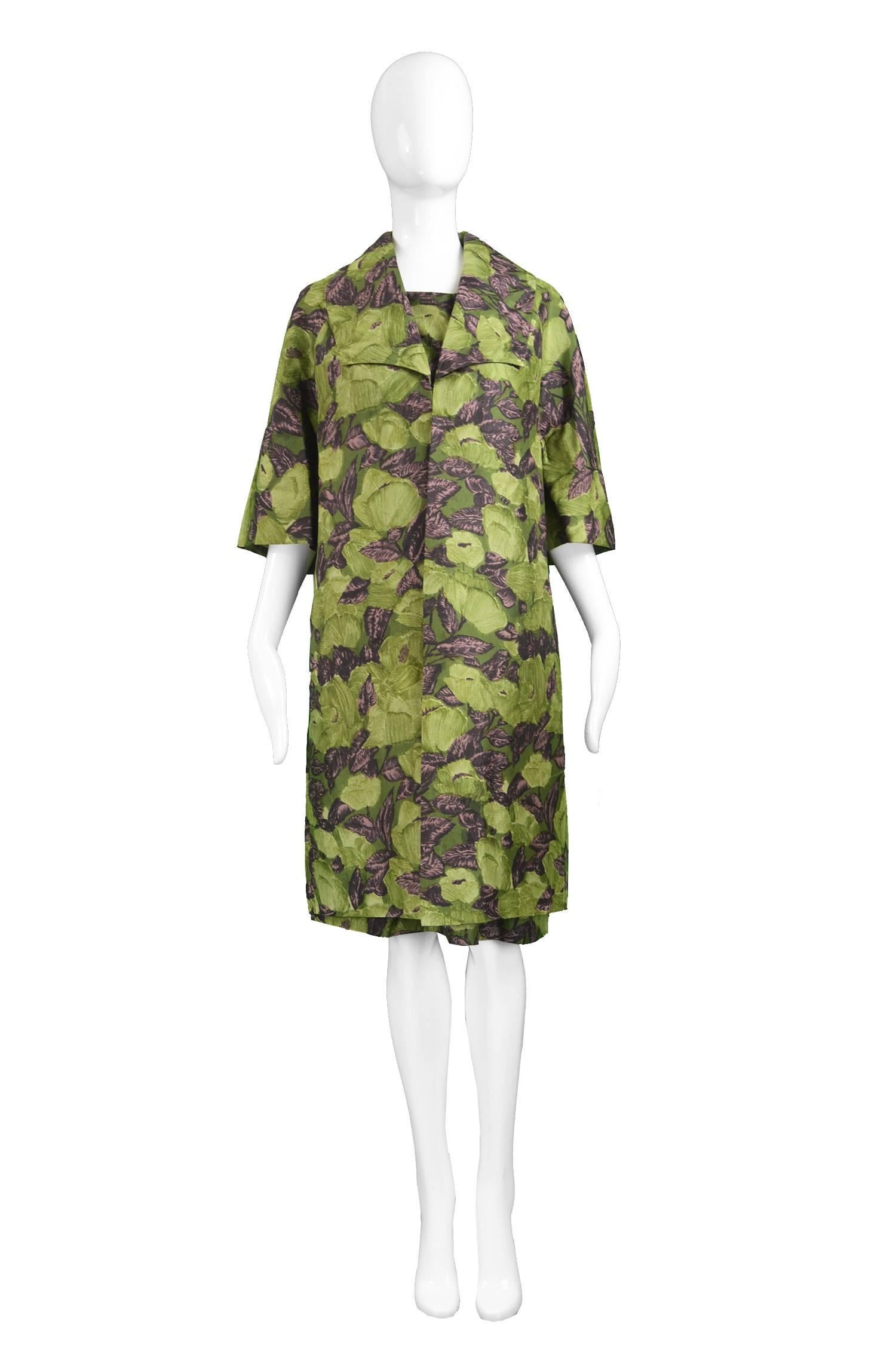 Dellwood Model Green Floral Silk Two Piece Dress & Jacket Set, c. 1960s

Estimated Size: UK 14/ US 10/ EU 42. Please check measurements.
Bust - 38” / 96cm
Waist - 32” / 81cm
Hips - 42” / 106cm
Length (Shoulder to Hem) - 40” / 101cm
Shoulder to