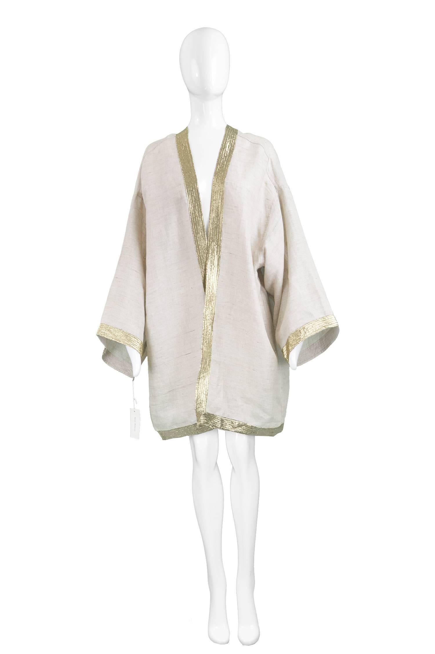 Isaac Mizrahi Vintage Beige Linen & Gold Lamé Kimono Jacket, 1990s

Size: One Size fits All.
Bust -Free
Waist - Free
Length (Shoulder to Hem) - 32” / 81cm
Sleeve Pit to Cuff - 15” / 38cm
 
Condition: Unworn with tags. No holes, stains or