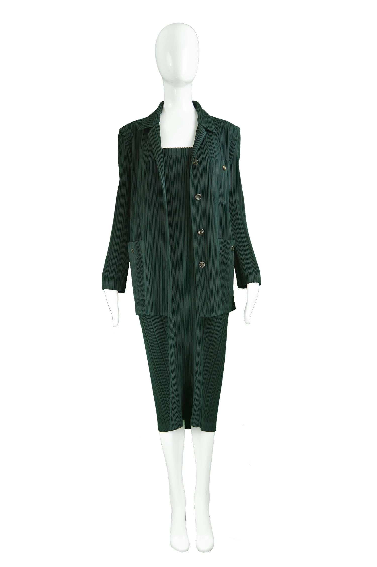 Issey Miyake Vintage Two Piece Pleated Jacket & Dress / Skirt Set, 1990s

Size: Marked a women’s Medium.
Jacket
Bust - 38” / 96cm
Length (Shoulder to Hem) - 27” / 68cm
Shoulder to Shoulder - 17” / 43cm
Sleeve Pit to Cuff - 16” / 40cm
Sleeve