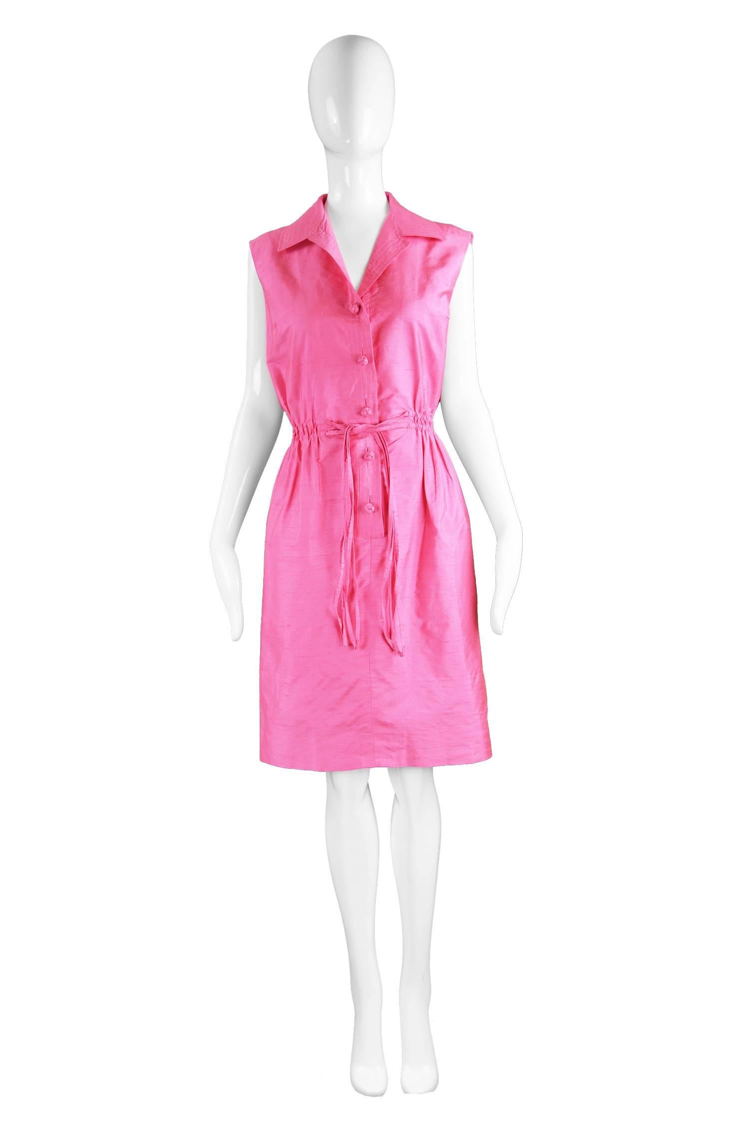 Carven Paris Shocking Pink Silk Shantung Sleeveless Shirt Dress, 1960s

Size: fits like a UK 10-12/ US 6-8/ EU 38-40. Please check measurements. 
Bust - up to 38” / 96cm (has a loose fit on top)
Waist - Stretches from 26-32” / 66-81cm
Hips - 38” /