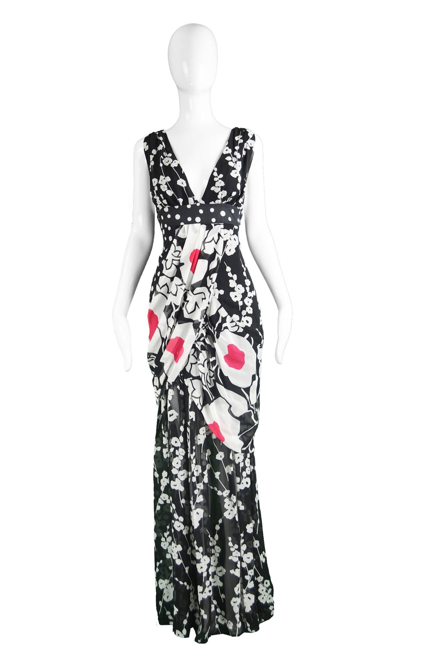 Kenzo Black & White Draped Floral Polka Dot Silk Chiffon Maxi Dress

A stunning Kenzo maxi dress in a black and white silk chiffon with polka dots in panels and a bold Japanese / Asian inspired floral print in others. The silhouette is so