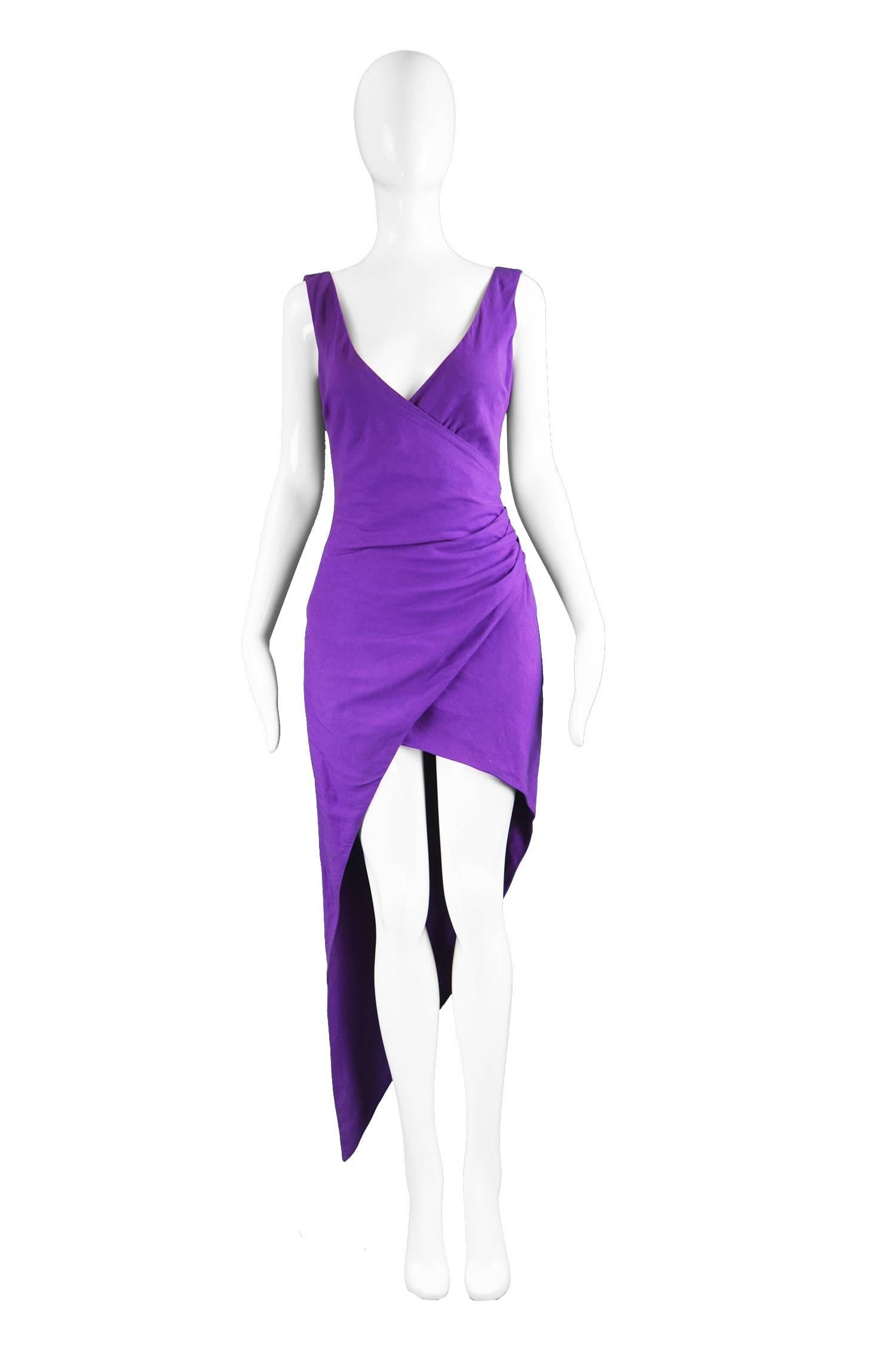 Byblos Vintage Asymmetric Purple Linen Mini Party Dress, 1990s

Estimated Size: UK 8-10/ US 4-6/ EU 36-38 (Please check measurements). 
Bust - 34” / 86cm 
Waist - 26” / 66cm
Hips - 38” / 96cm
Length (Minus train) - 34” / 86cm 
Length (To bottom of