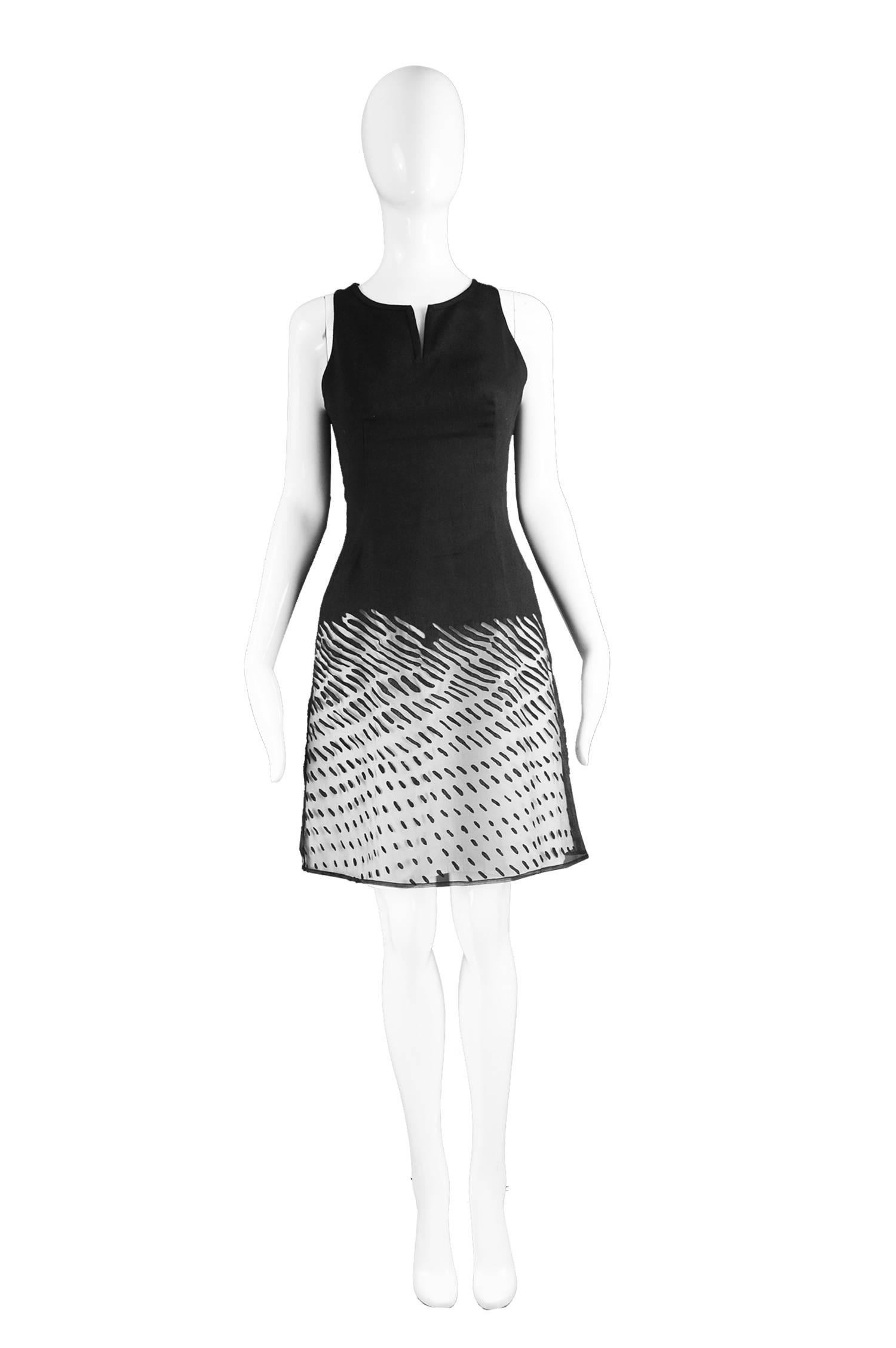 Kenzo Vintage Black Linen & Flocked Organza Sleeveless Dress, 1990s

Estimated Size: UK 8/ US 4/ EU 36. Please check measurements. 
Bust - 32” / 81cm
Waist - 26” / 66cm
Hips - 34” / 86cm
Length (Shoulder to Hem) - 36” / 91cm

Condition: Excellent