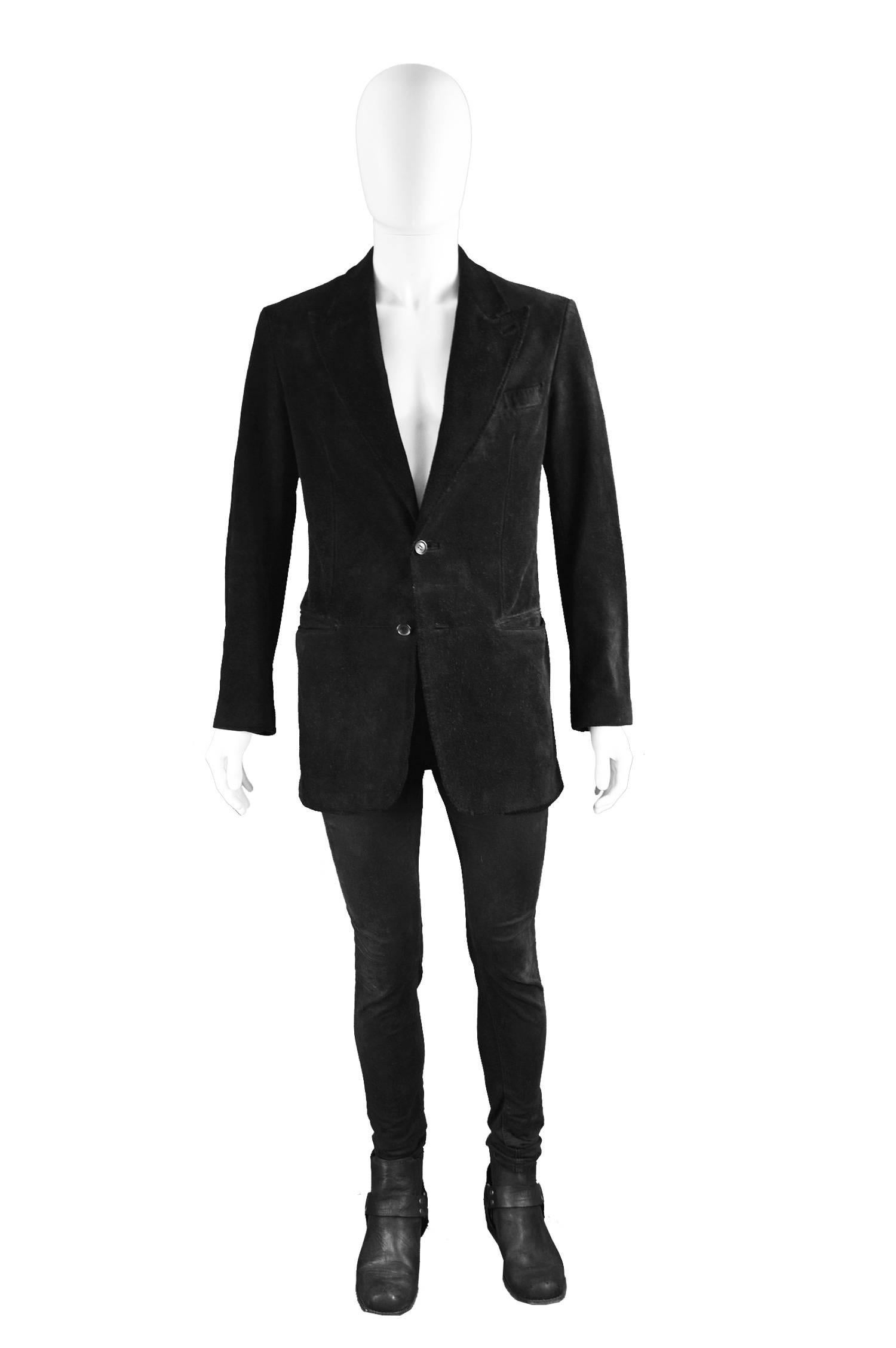 Tom Ford for Gucci Men's Black Suede Blazer with Peaked Lapels, A/W 2002

Size: Marked 48 which is roughly a men's Small
Chest - 42” / 106cm (please remember to leave roughly 4 inch room for movement and thickness of suede)
Waist - 36” / 91cm
Length