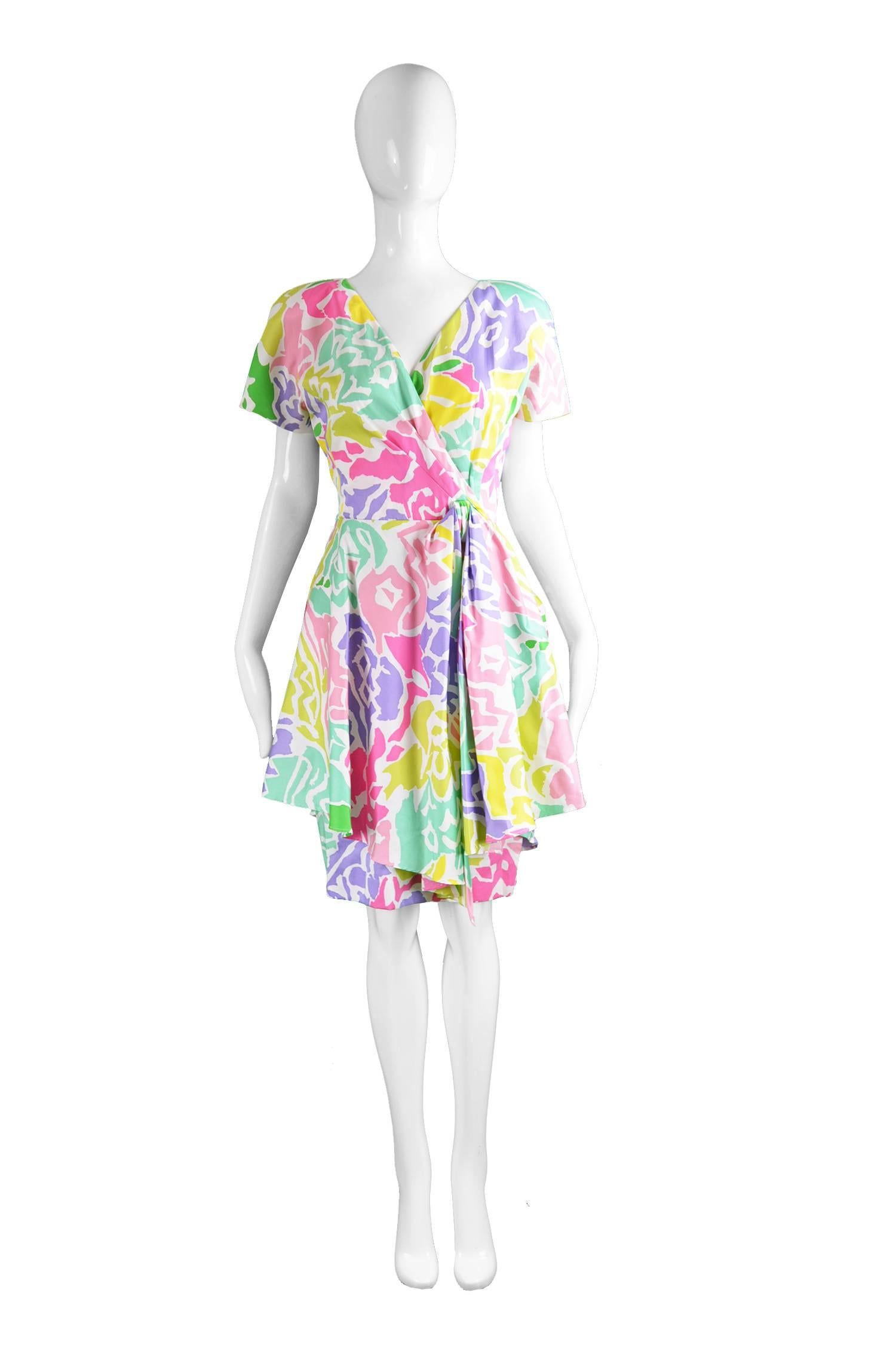 Guy Laroche Vintage Multicolored Cotton Peplum Flared Dress, 1980s

Estimated Size: UK 8-10/ US 4-6/ EU 36-38. Please check measurements.
Bust - 36” / 91cm (has a loose fit on the bust)
Waist - 27” / 69cm
Hips - 38” / 96cm
Length (Shoulder to Hem) -