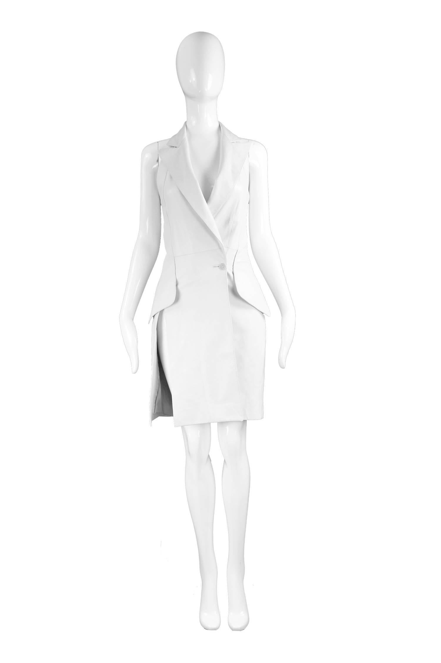 Alexander McQueen for Givenchy Couture 'Cowgirls' White Leather Dress, S/S 1998

Estimated Size: UK 10/ US 6/ EU 38. Please check measurements to ensure fit. 
Bust - 34” / 86cm
Waist - 28” / 71cm
Hips - 36” / 91cm
Length (Bust to Hem) - 27” /