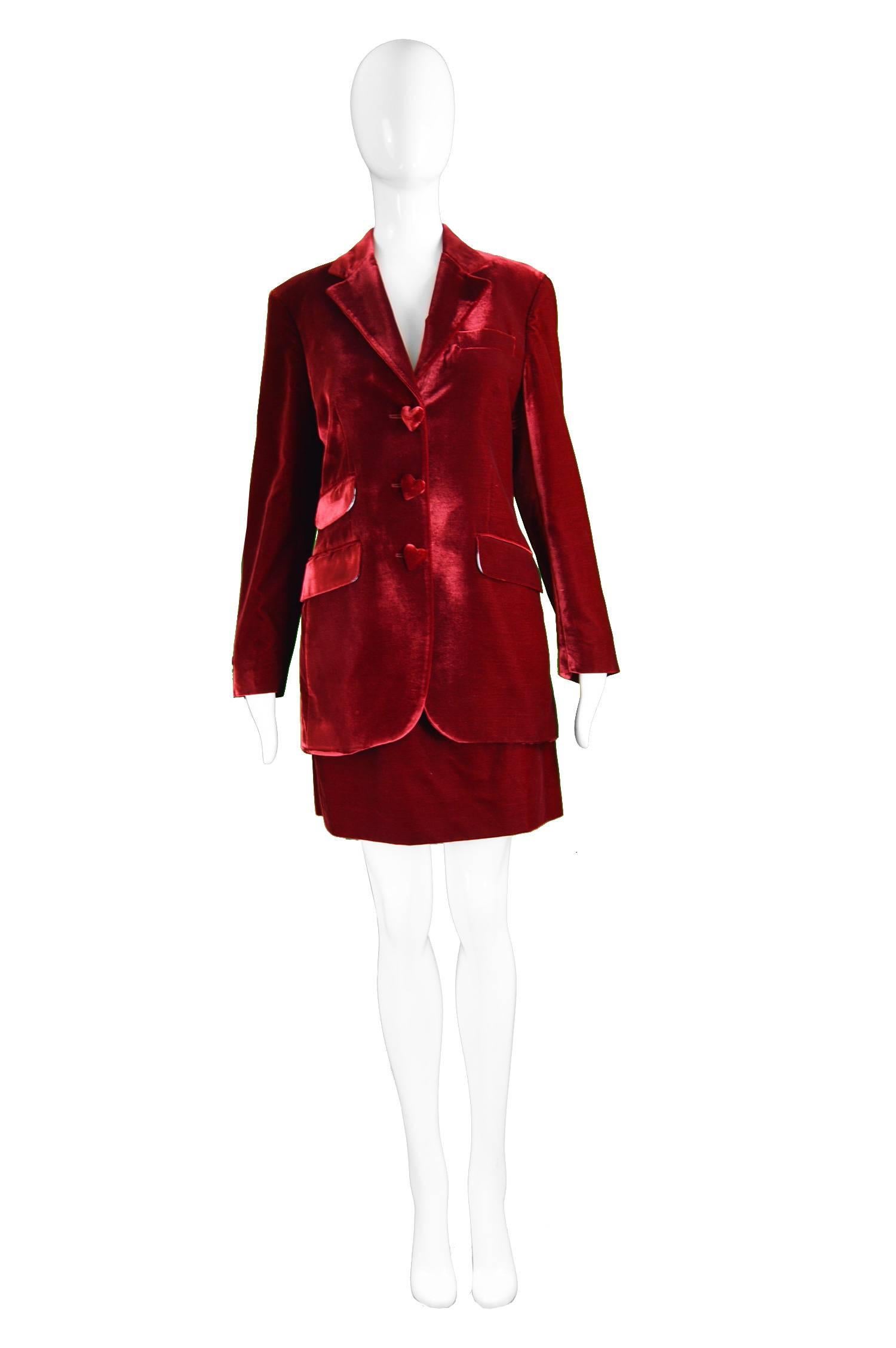 Moschino Deep Red Velvet Heart Button Skirt Suit & Cloud Silk Lining, 1990s


Size: Jacket is marked a UK 10, skirt a  UK 12 but both pieces fit a UK 10 / US 6/ EU 38 best due to the slightly roomier fit of the jacket. Please check