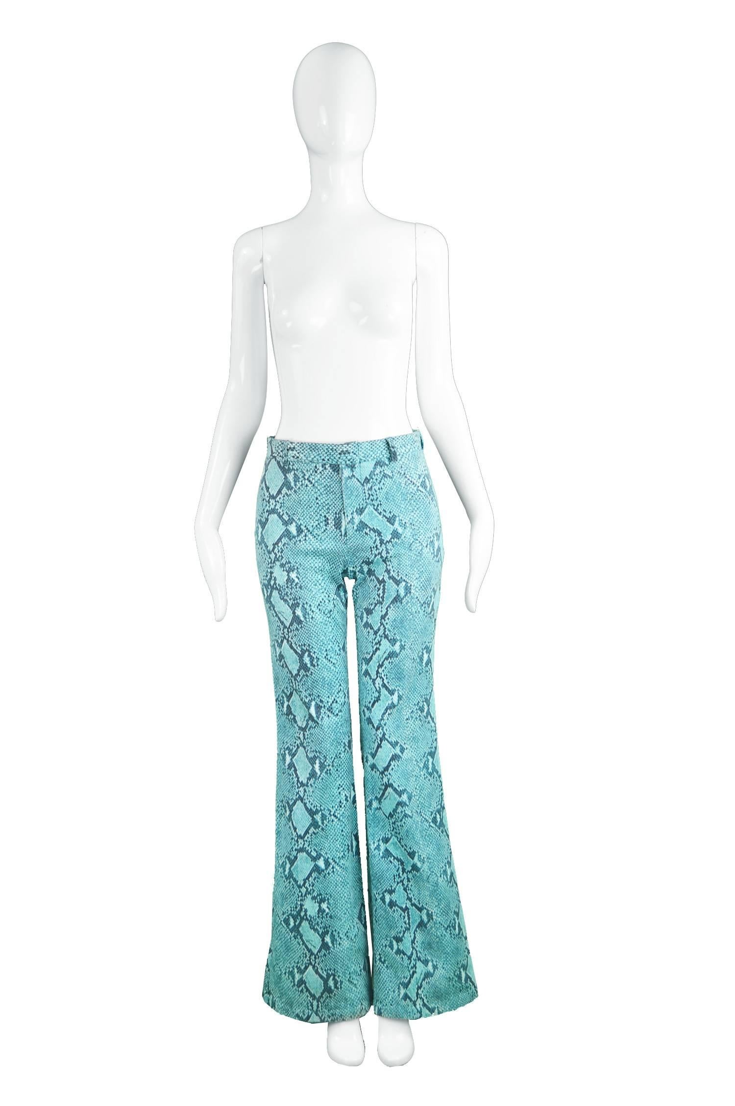 Tom Ford for Gucci Blue Cotton Snakeskin Print Flared Pants, S/S 2000

Size: Marked 40 but fits more like a modern UK 10/ US 6/ EU 38. Please check measurements. 
Waist - 29” / 73cm
Hips - 38” / 98cm
Rise - 12” / 30cm
Inside Leg - 34” / 86cm

An