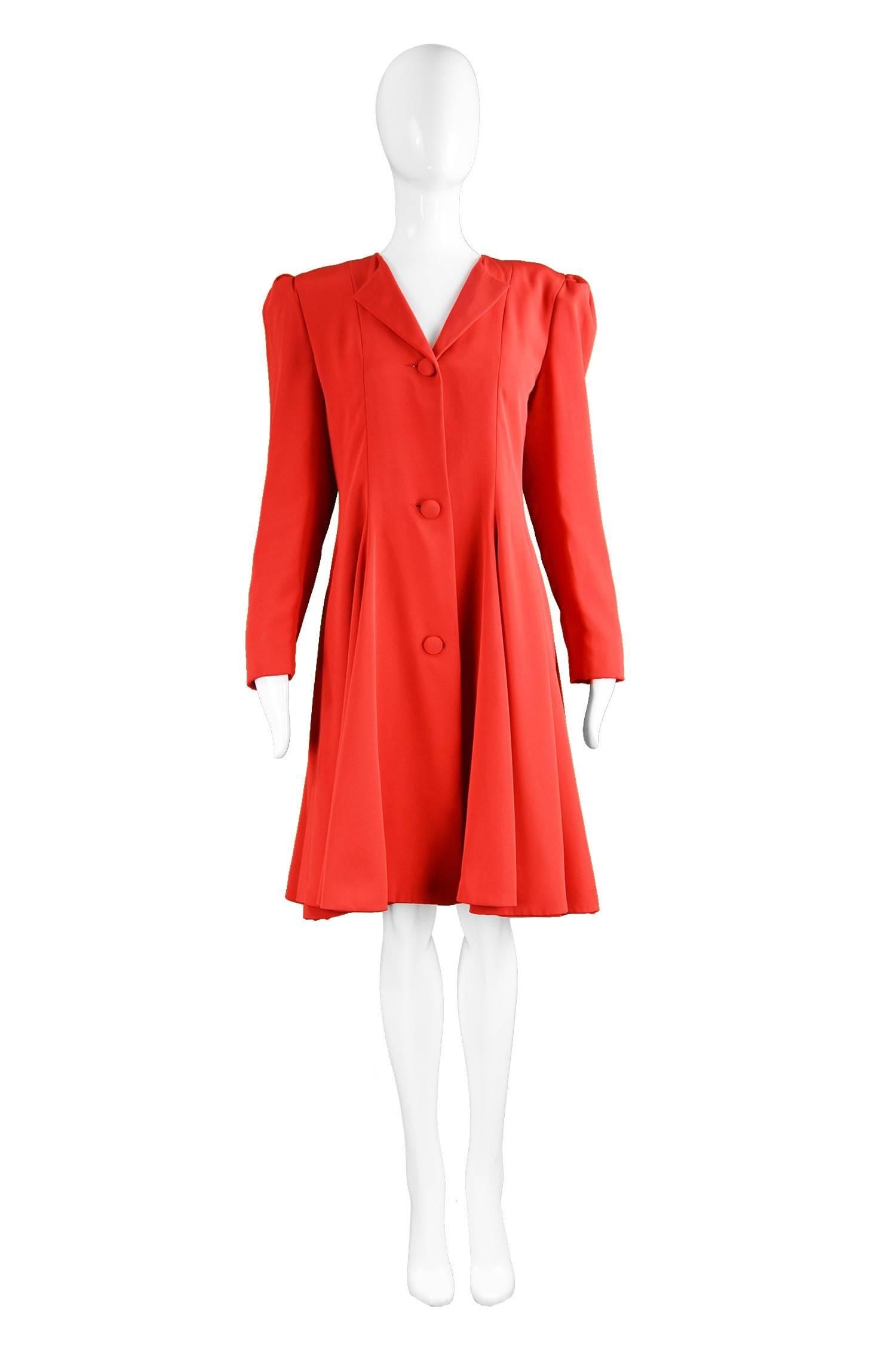 Carolina Herrera For Neiman Marcus Red Silk Full Skirt Evening Coat, 1980s

Estimated Size: UK 12-14 / US 8-10/ EU 40-42. Please check measurements.
Bust - 38” / 96cm
Waist - 32” / 81cm
Hips - Free
Length (Shoulder to Hem) - 39” / 99cm
Sleeve Pit to