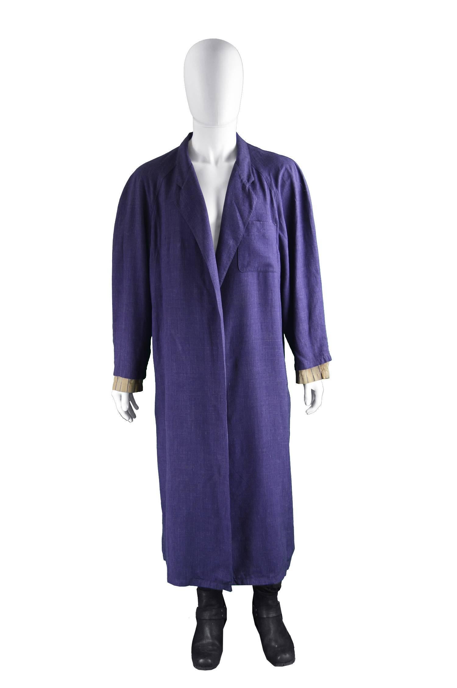 Jean Paul Gaultier Homme Pour Gibo Loose Purple Linen Coat, 1980s

Size: One Size fits Most, meant to have a loose fit. 
Chest - up to 48” / 122cm (has a loose, oversized fit and is meant to be worn open so chest size doesn’t really matter)
Length