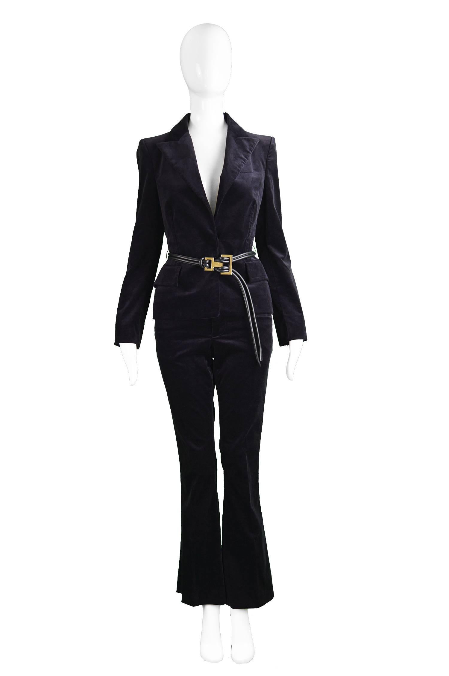 Tom Ford for Gucci Dark Purple Velvet Pant Suit with Leather Belt, Fall 2004

Estimated Size: UK 10 / US 6/ EU 38. Please check measurements.
Jacket
Bust - 34” / 86cm
Length (Shoulder to Hem) - 22” / 56cm
Shoulder to Shoulder - 15”  / 38cm
Sleeve