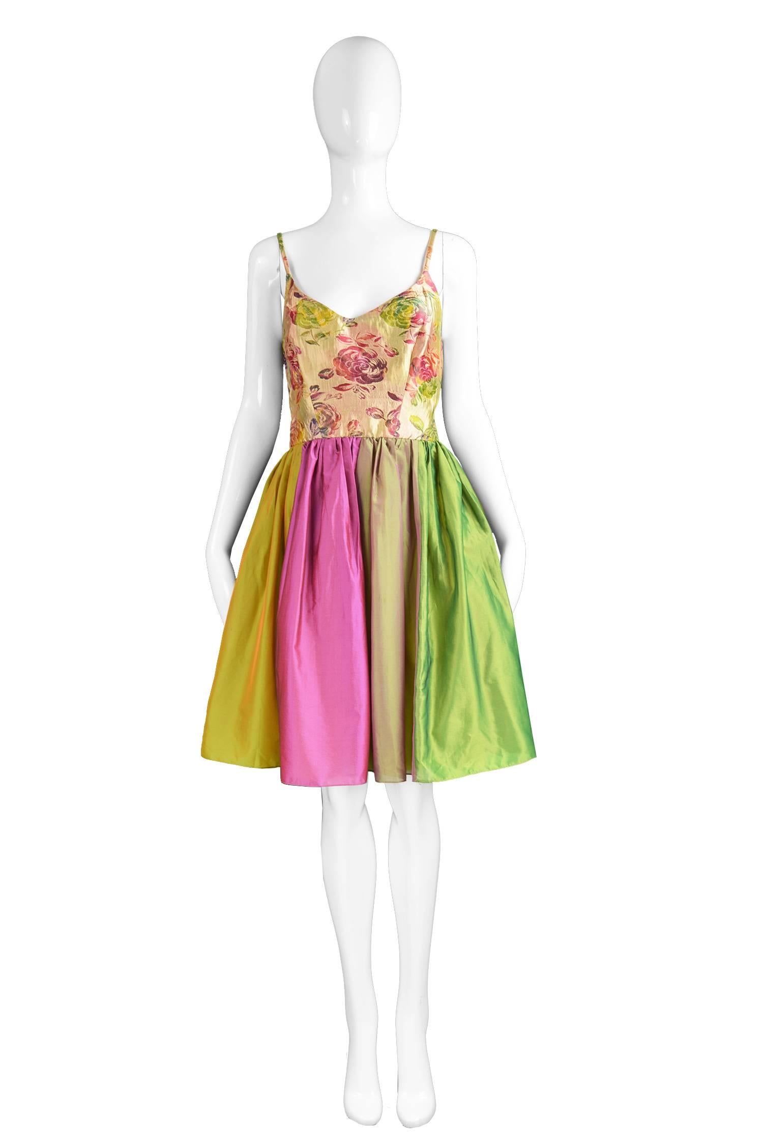 Ben de Lisi Vintage Floral Brocade & Iridescent Metallic Silk Dress, 1990s

Estimated Size: UK 12 / US 8/ EU 40. Please check measurements. 
Bust - 36” / 91cm
Waist - 30” / 76cm
Hips - Free
Length (Bust to Hem) - 29” / 73cm

A beautiful vintage