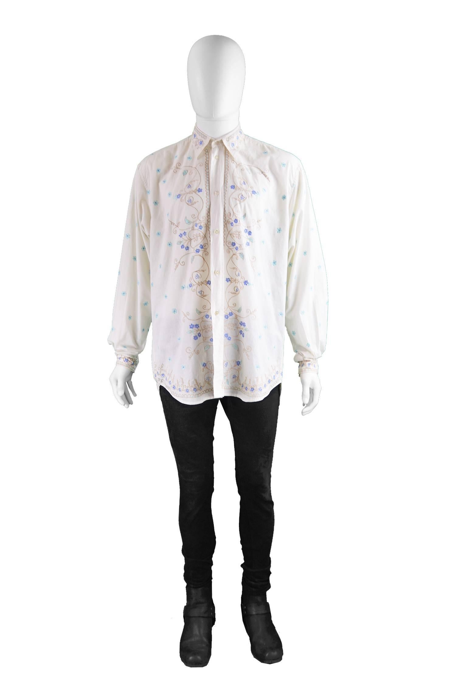 Katharine Hamnett Men's Vintage Floral Embroidered Cotton Shirt, 1990s

Size: Marked S but has a loose oversized fit.
Chest - 50” / 127cm
Length (Shoulder to Hem) - 29” / 73cm
Shoulder to Shoulder - 20” / 51cm
Sleeve Pit to Cuff - 24” / 61cm
Sleeve