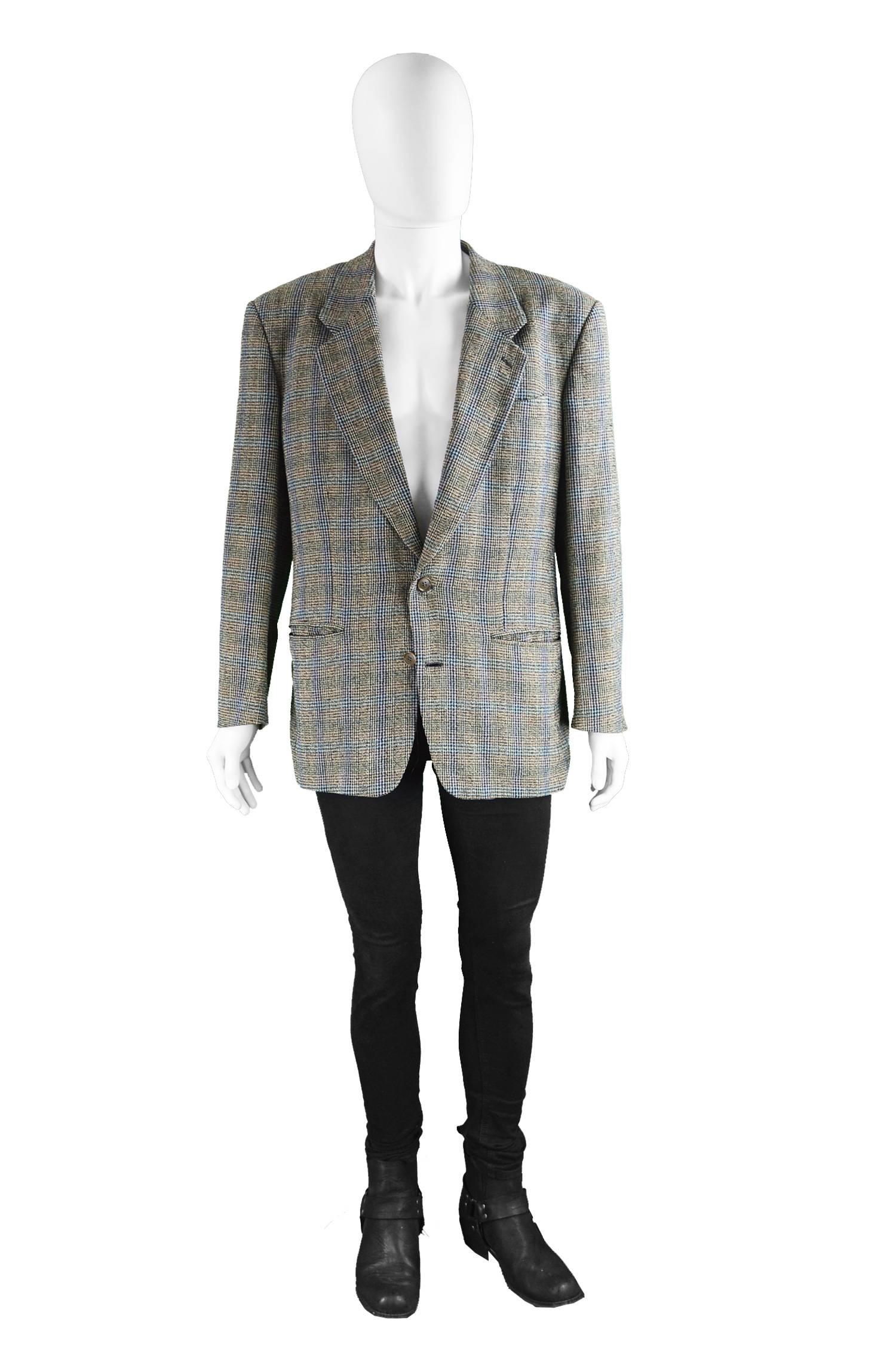Missoni Uomo Vintage Mens Multicolored Checked Wool sport Coat, 1980s

Estimated Size: Men's Large. Please check measurements. 
Chest - 44” / 112cm (allow a couple of inches room for movement)
Length (Shoulder to Hem) - 29” / 73cm
Shoulder to