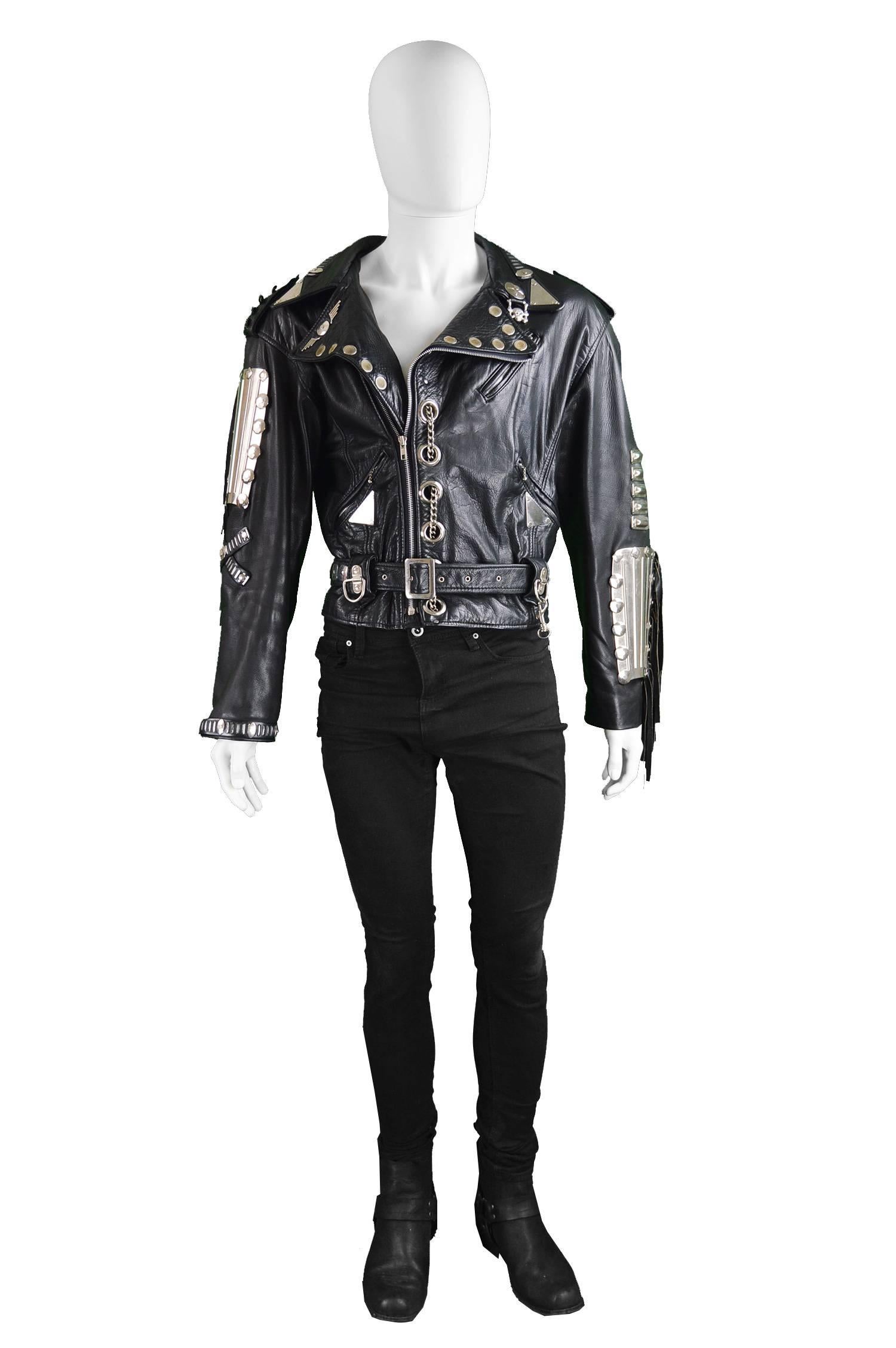 Kim Hadleigh Designs Vintage Mens Armor Plated Leather Jacket, 1980s

Size: Marked M but would also suit a men's Small. 
Chest - 42” / 106cm (allow a couple of inches room for movement)
Length (Shoulder to Hem) - 22” / 56cm
Shoulder to Shoulder -