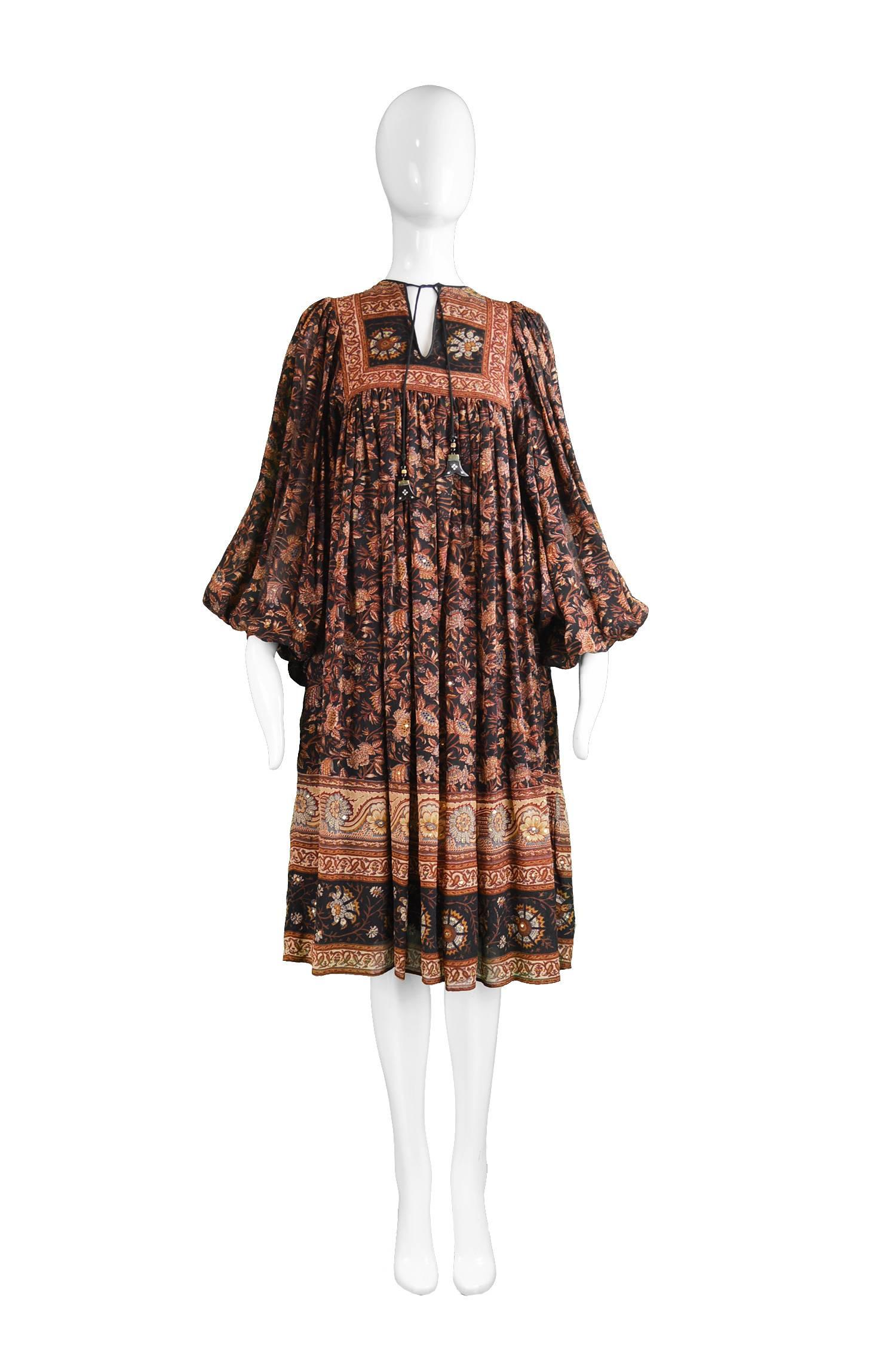 Jean Varon & Ritu Kumar Indian Silk Vintage Balloon Sleeve Dress, 1970s

Estimated Size: Women's Small to Medium due to loose, flowing fit as with many of these Indian dresses. Please check measurements.
Bust - More dependant on waist due to