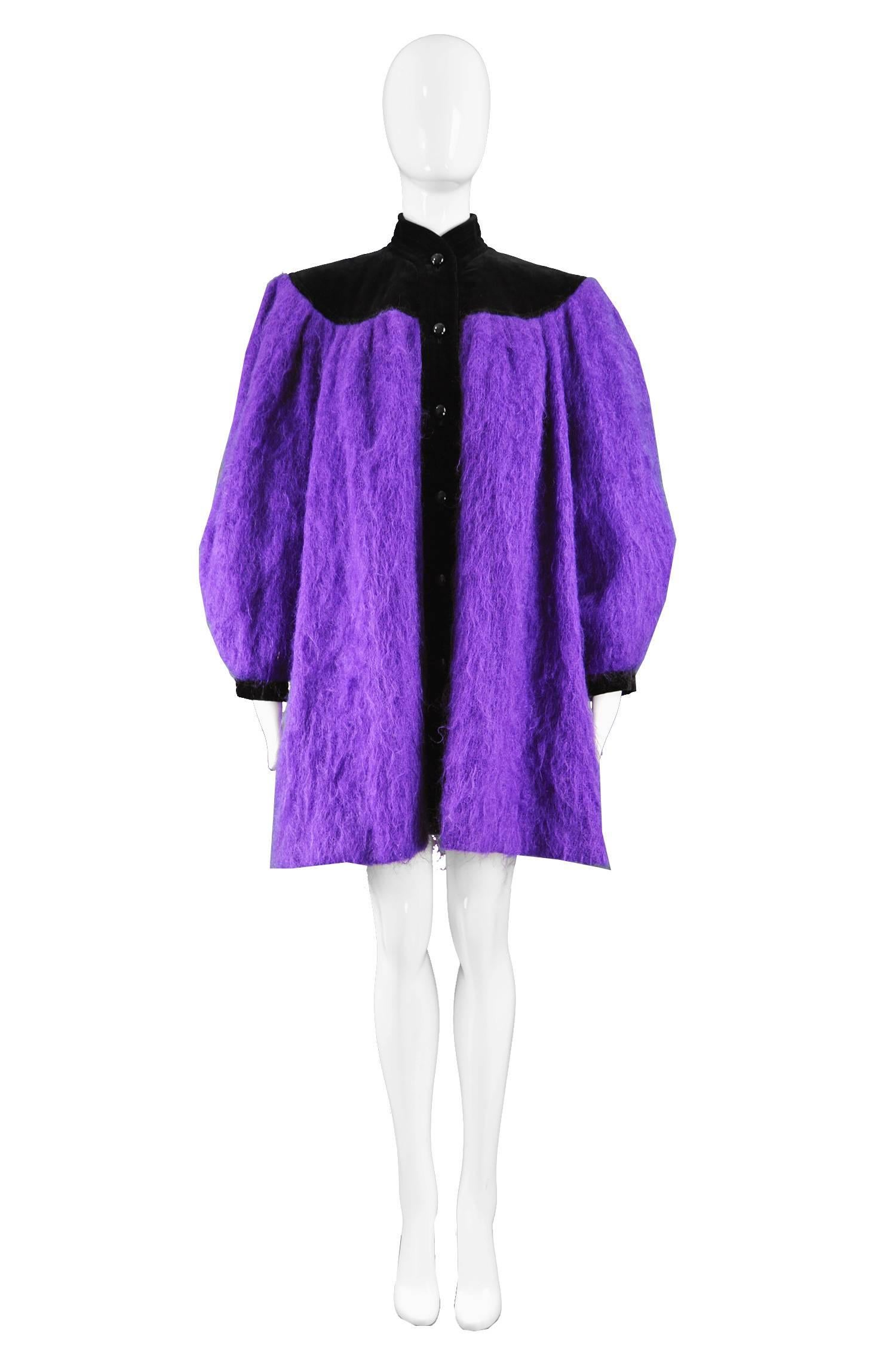 Yves Saint Laurent Purple Mohair & Black Velvet Vintage Coat, 1980s

Size: Marked FR 36 which is roughly a women's Small but due to the intentionally oversized fit it would suit a Small to Large. 
Bust - up to 48” / 122cm (has an oversized