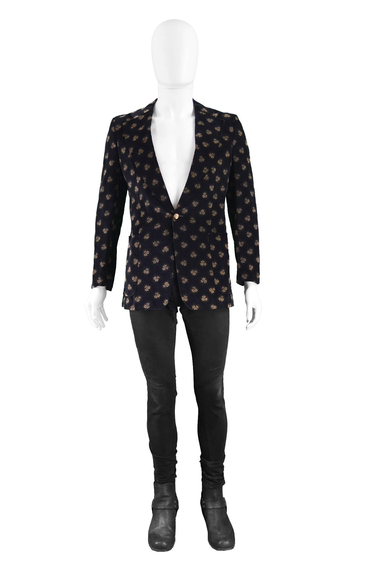 Harold Tillman Men's Vintage Black Velvet Floral Print Dinner Jacket, 1970s

Estimated Size: Men's XS. Please check measurements. 
Chest - 38” / 96cm (allow a couple of inches room for movement)
Waist - 35” / 89cm
Length (Shoulder to Hem) - 28” /