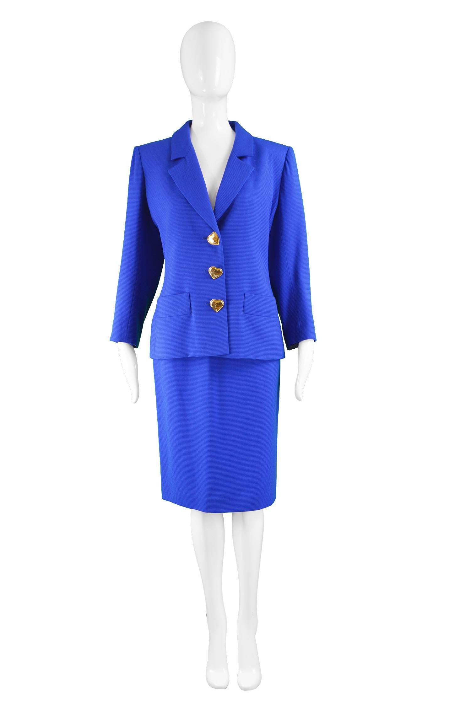 YSL Blue Wool Blazer & Skirt Suit with Heart Buttons, 1980s

Estimated Size: UK 12-14/ US 10-12/ EU 40-42. Please check measurements.
Jacket
Bust - 40” / 101cm (allow a couple of inches room for movement)
Waist - 36” / 91cm
Length (Shoulder to