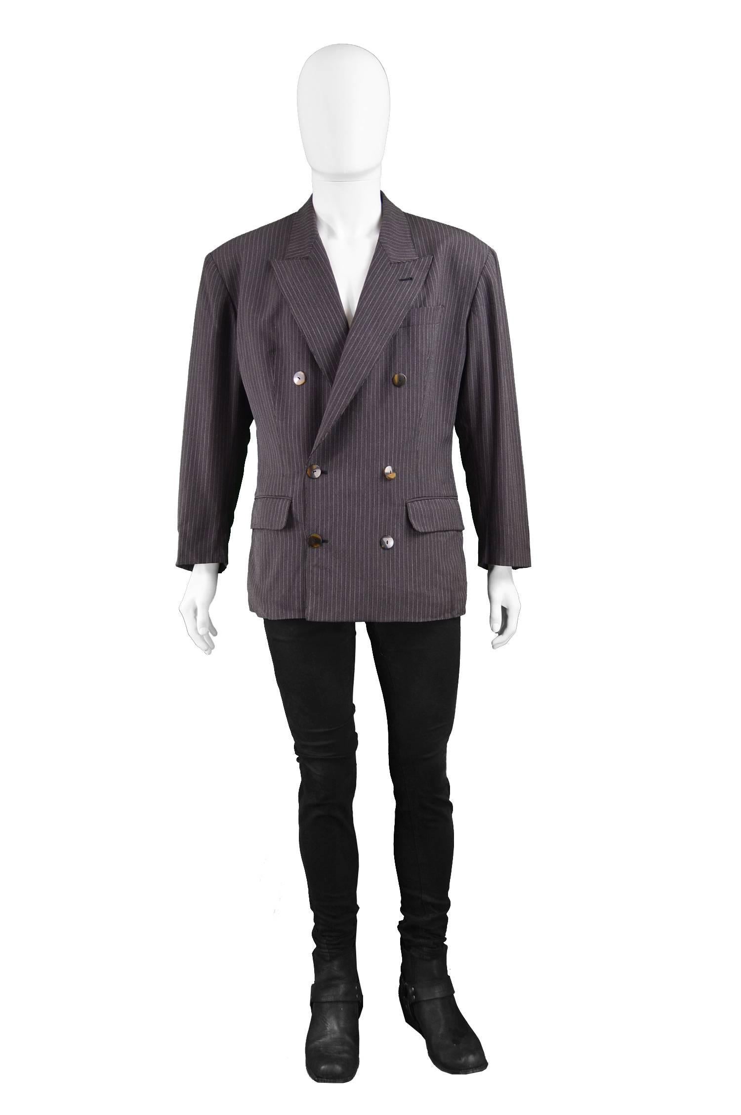 Jean Paul Gaultier Homme Pour Gibo Vintage Men's Double Breasted Blazer, 1980s

Size: Marked size 50 which is roughly a men’s Medium to Large. Please check measurements.
Chest - 44” / 111cm (has a slightly looser fit on chest to create Gaultier’s