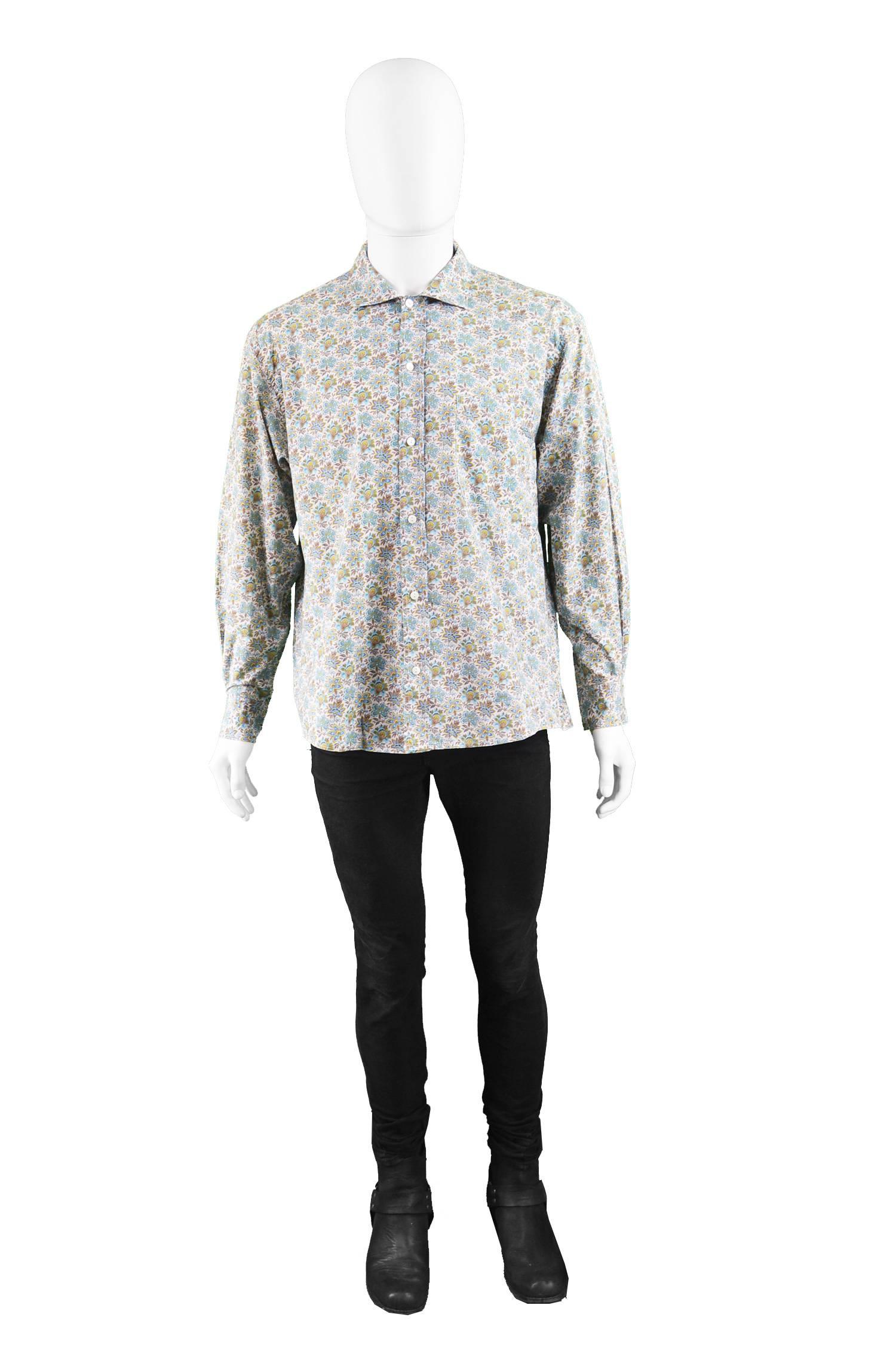 Kenzo Paris Mens Vintage Floral Print Cotton Button Up Shirt, 1990s

Estimated Size: Men's Large but has an intentional looser, relaxed fit. 
Chest - 44” / 112cm
Waist - 44” / 112cm
Length (Shoulder to Hem) - 26” / 66cm
Shoulder to Shoulder - 20” /