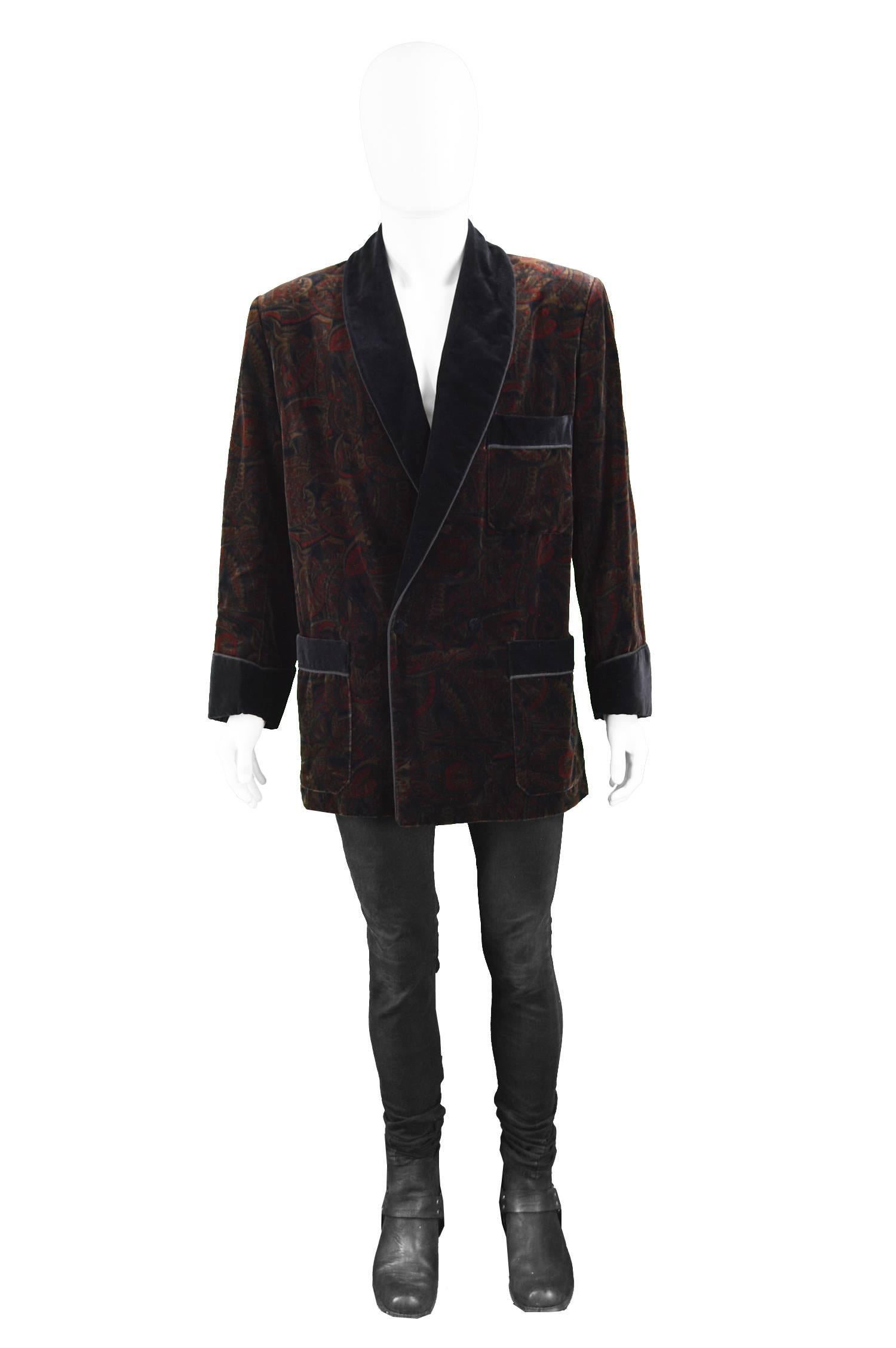 Vintage Men's Paisley Print Velvet Smoking Jacket with Braided Lapels, 1980s

Size: Marked 50 which is roughly a men's Medium but has a loose, relaxed fit, as pictured, like most smoking jackets. 
Chest - up to 46” / 117cm (has a looser fit)
Waist -