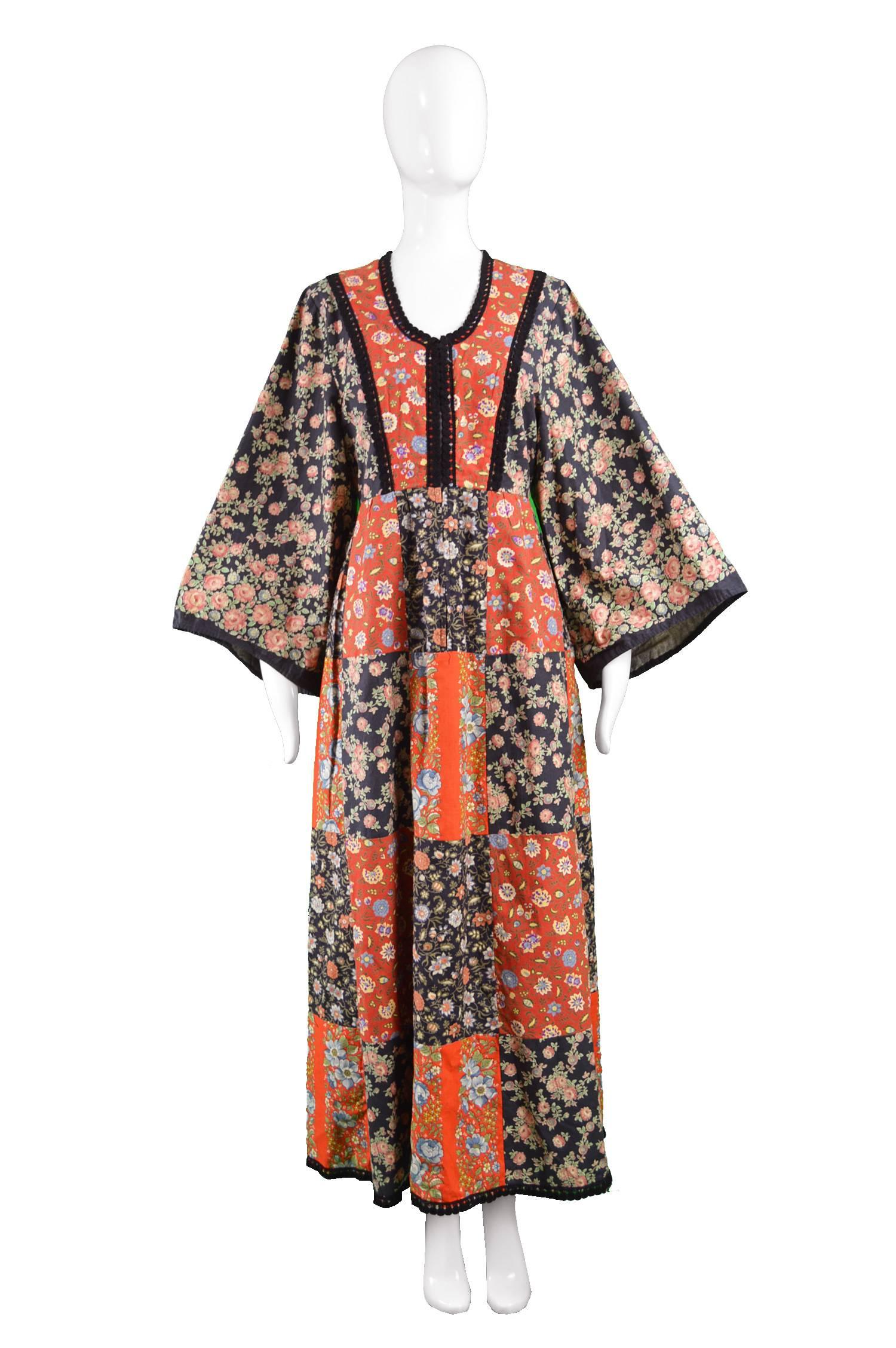 Angela Gore Vintage Patchwork Floral Print Cotton Maxi Kimono Dress, 1970s

Estimated Size: UK 12/ US 8/EU 40. Please check measurements.
Bust - 36” / 91cm
Waist - 32” / 81cm
Hips - Free
Length (Shoulder to Hem) - 54” / 137cm
Shoulder to Shoulder -