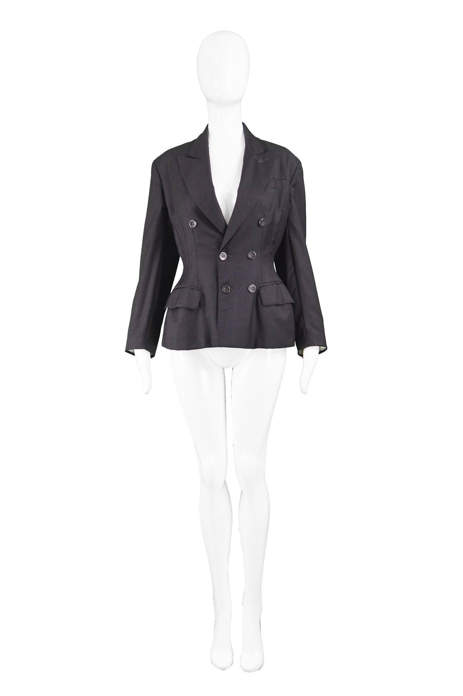 Jean Paul Gaultier Vintage Grey Women's Corset Inspired Pinstripe Blazer, 1990s

Estimated Size: UK 12/ US 8/ EU 40. Please check measurements. 
Bust - 36” / 91cm
Waist - 30” / 76cm
Hem - 42” / 106cm
Length (Shoulder to Hem) - 23” / 58cm
Shoulder to