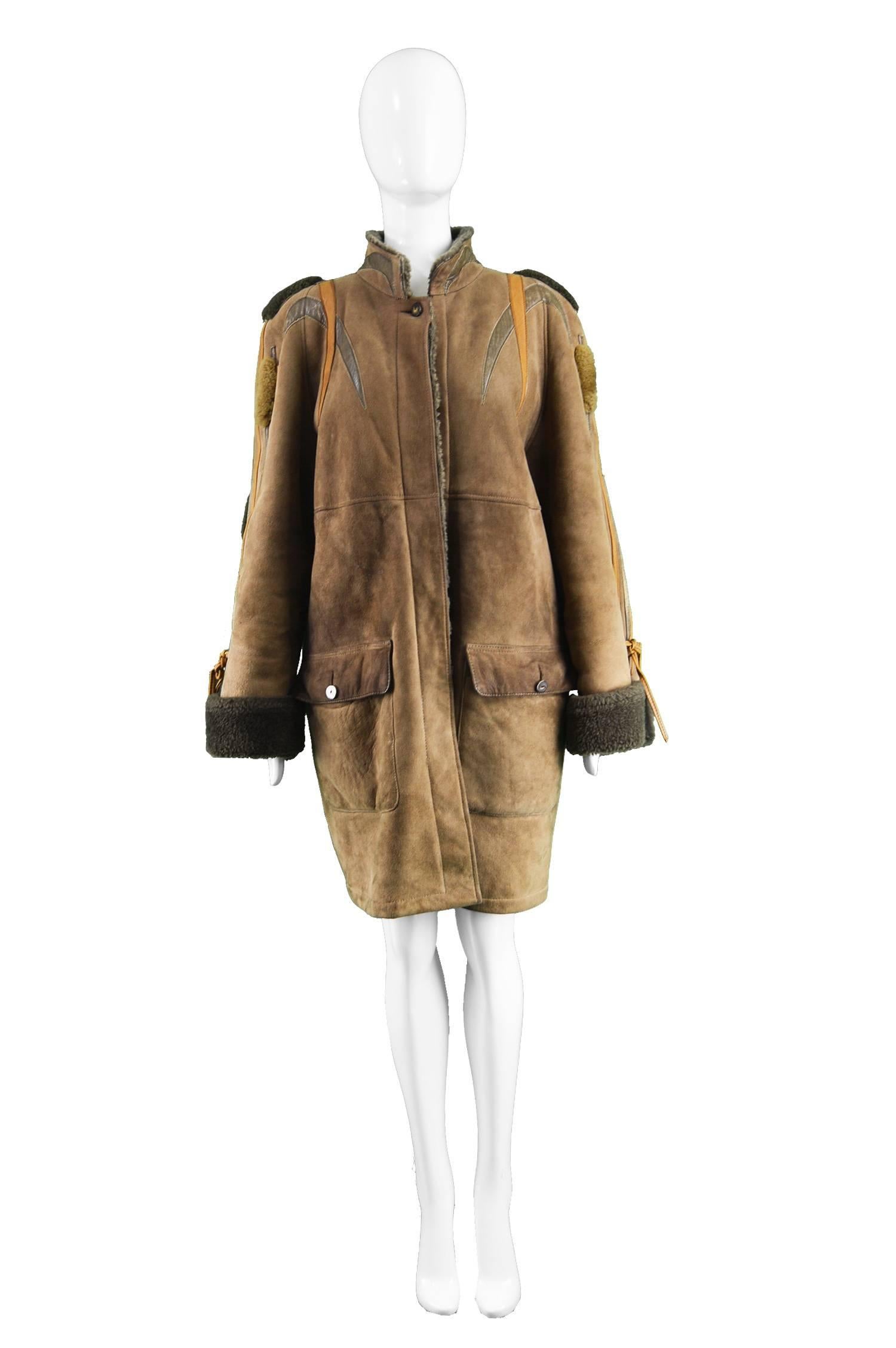 JC de Castelbajac Vintage Women's Oversized Suede Trim Sheep Skin Coat, 1980s

Estimated Size: Best suits a women's Medium with an intentional loose fit or a Large for a more fitted look. Please check measurements.
Chest - up to 46” / 117cm (has a